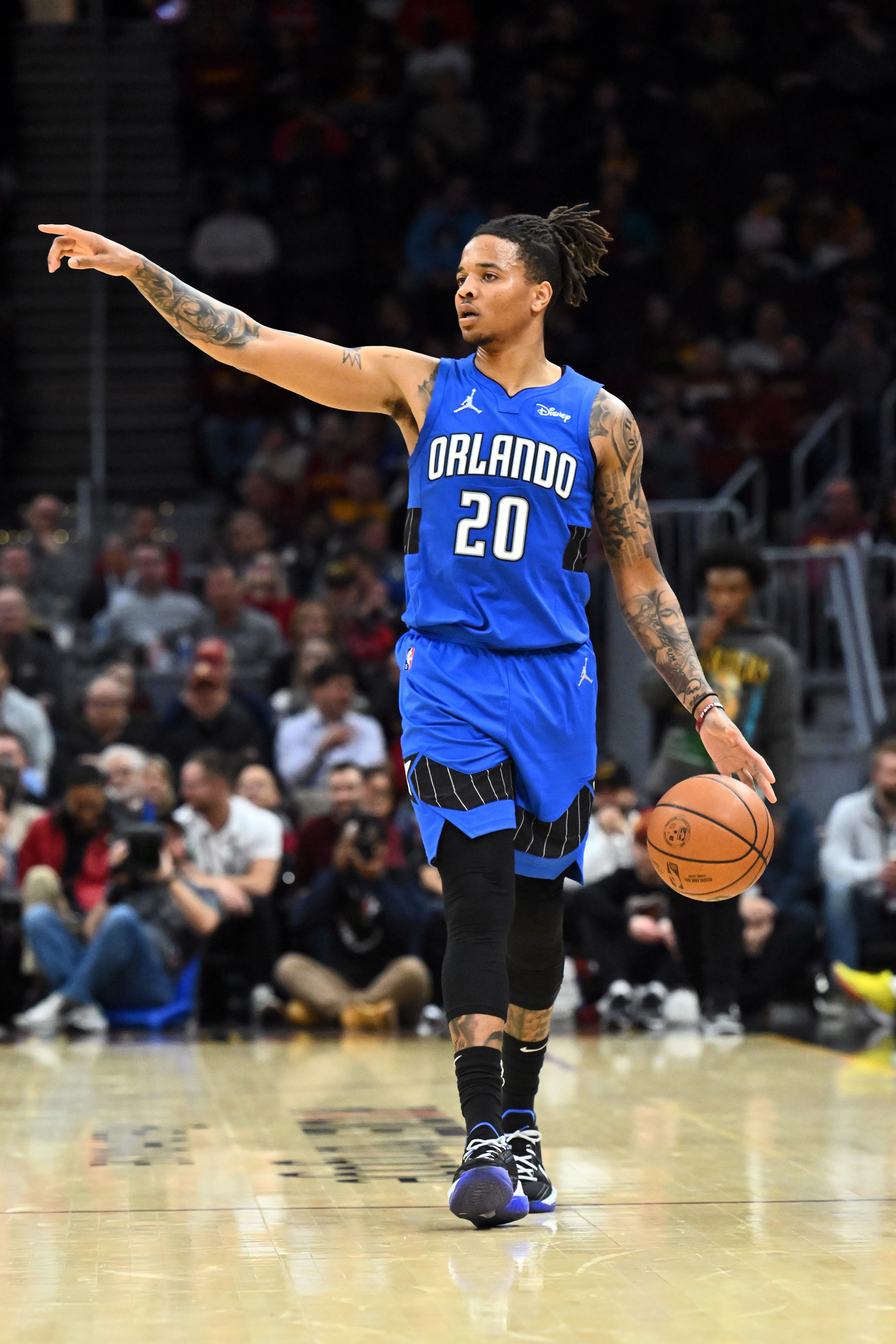 CLEVELAND, OHIO - MARCH 28: Markelle Fultz #20 of the Orlando Magic brings the ball up court during the fourth quarter against the Cleveland Cavaliers at Rocket Mortgage Fieldhouse on March 28, 2022 in Cleveland, Ohio. The Cavaliers defeated the Magic 107-101. NOTE TO USER: User expressly acknowledges and agrees that, by downloading and/or using this photograph, user is consenting to the terms and conditions of the Getty Images License Agreement. (Photo by Jason Miller/NBAE via Getty Images)