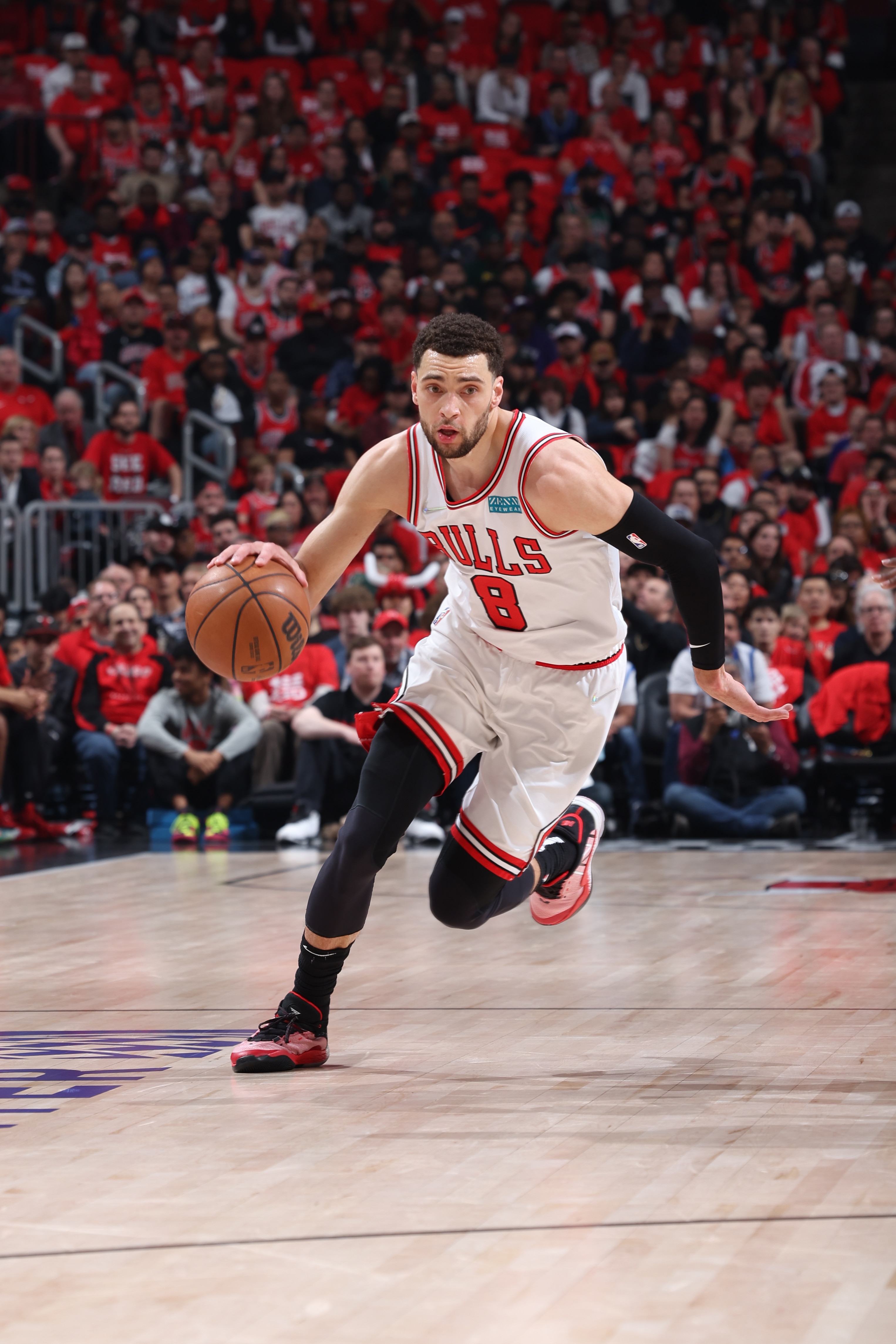 CHICAGO, IL - APRIL 24: Zach LaVine #8 of the Chicago Bulls drives to the basket during the game against the Milwaukee Bucks during Round 1 Game 4 of the 2022 NBA Playoffs on April 24, 2022 at United Center in Chicago, Illinois. NOTE TO USER: User expressly acknowledges and agrees that, by downloading and or using this photograph, User is consenting to the terms and conditions of the Getty Images License Agreement. Mandatory Copyright Notice: Copyright 2022 NBAE (Photo by Jeff Haynes/NBAE via Getty Images)