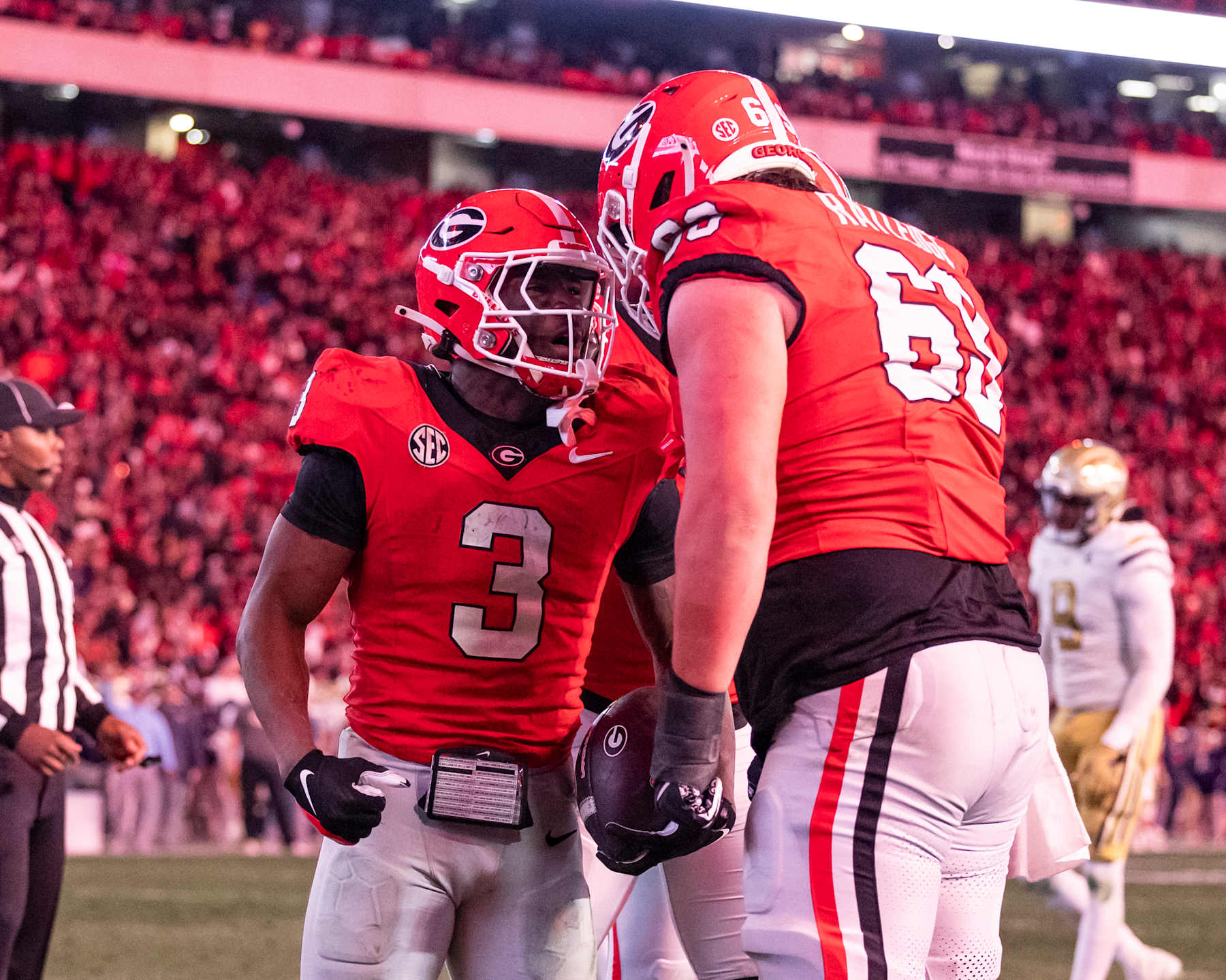 ATHENS, GEORGIA - NOVEMBER 29: Nate Frazier #3 and Tate Ratledge #69 of the Georgia Bulldogs celebrate a touchdown during a game between the Georgia Tech Yellow Jackets and the Georgia Bulldogs at Sanford Stadium on November 29, 2024 in Athens, Georgia.  (Photo by Steve Limentani/ISI Photos/Getty Images)