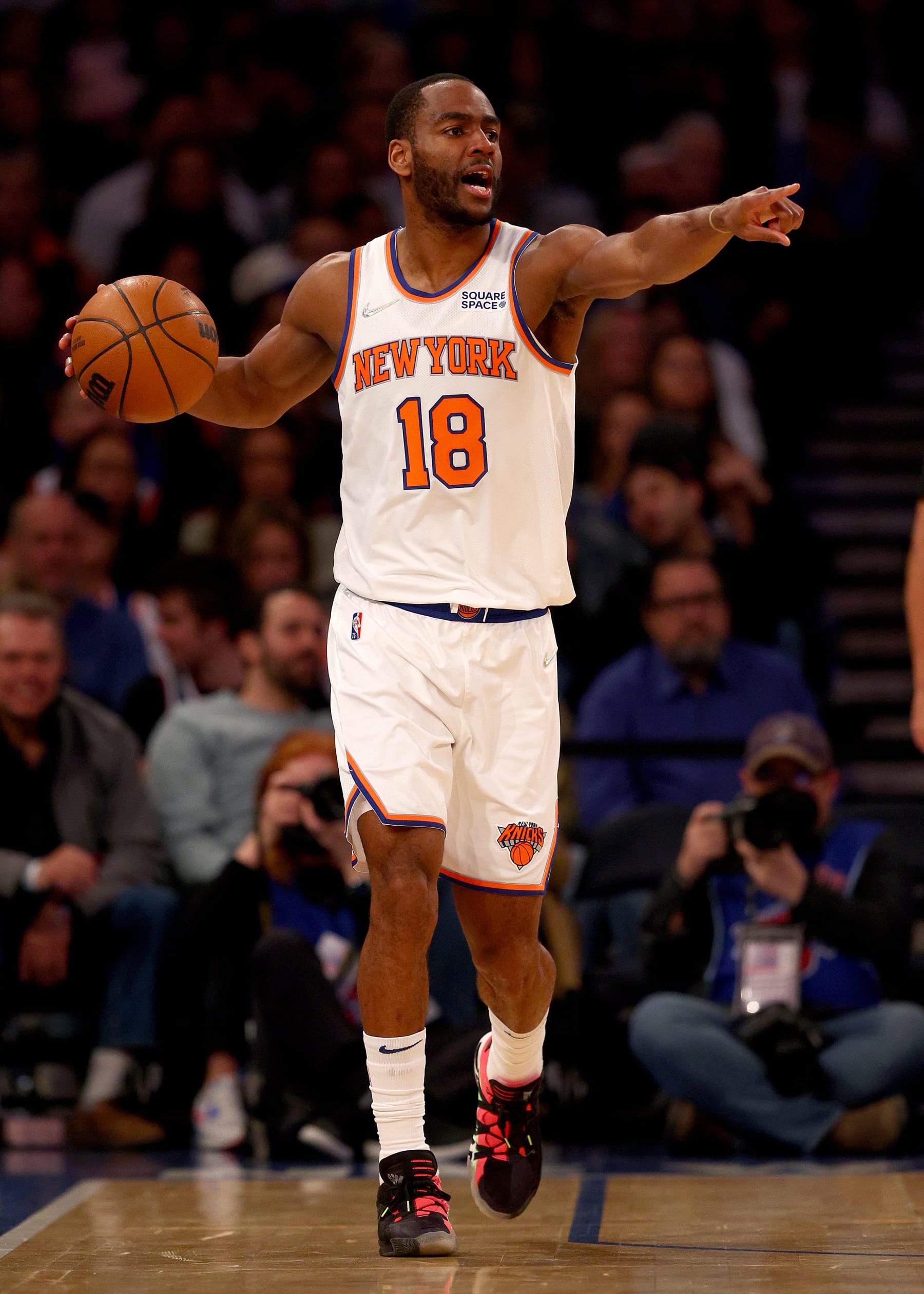 NEW YORK, NEW YORK - APRIL 10:  Alec Burks #18 of the New York Knicks directs his teammates during the first half against the Toronto Raptors at Madison Square Garden on April 10, 2022 in New York City. NOTE TO USER: User expressly acknowledges and agrees that, by downloading and or using this photograph, User is consenting to the terms and conditions of the Getty Images License Agreement. (Photo by Elsa/Getty Images)
