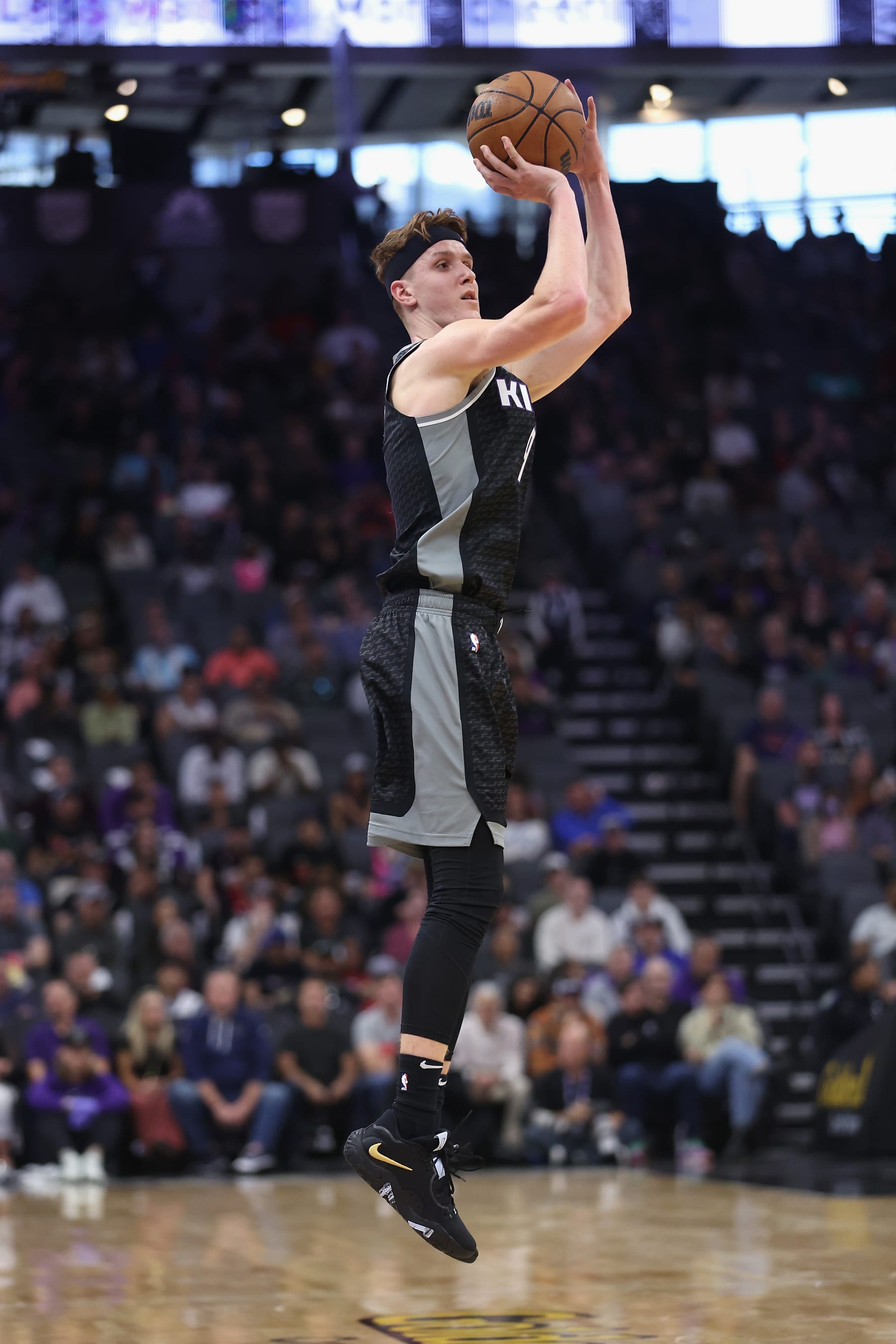 SACRAMENTO, CALIFORNIA - OCTOBER 29: Kevin Huerter #9 of the Sacramento Kings makes a three-point basket in the second quarter against the Miami Heat at Golden 1 Center on October 29, 2022 in Sacramento, California. NOTE TO USER: User expressly acknowledges and agrees that, by downloading and/or using this photograph, User is consenting to the terms and conditions of the Getty Images License Agreement. (Photo by Lachlan Cunningham/Getty Images)