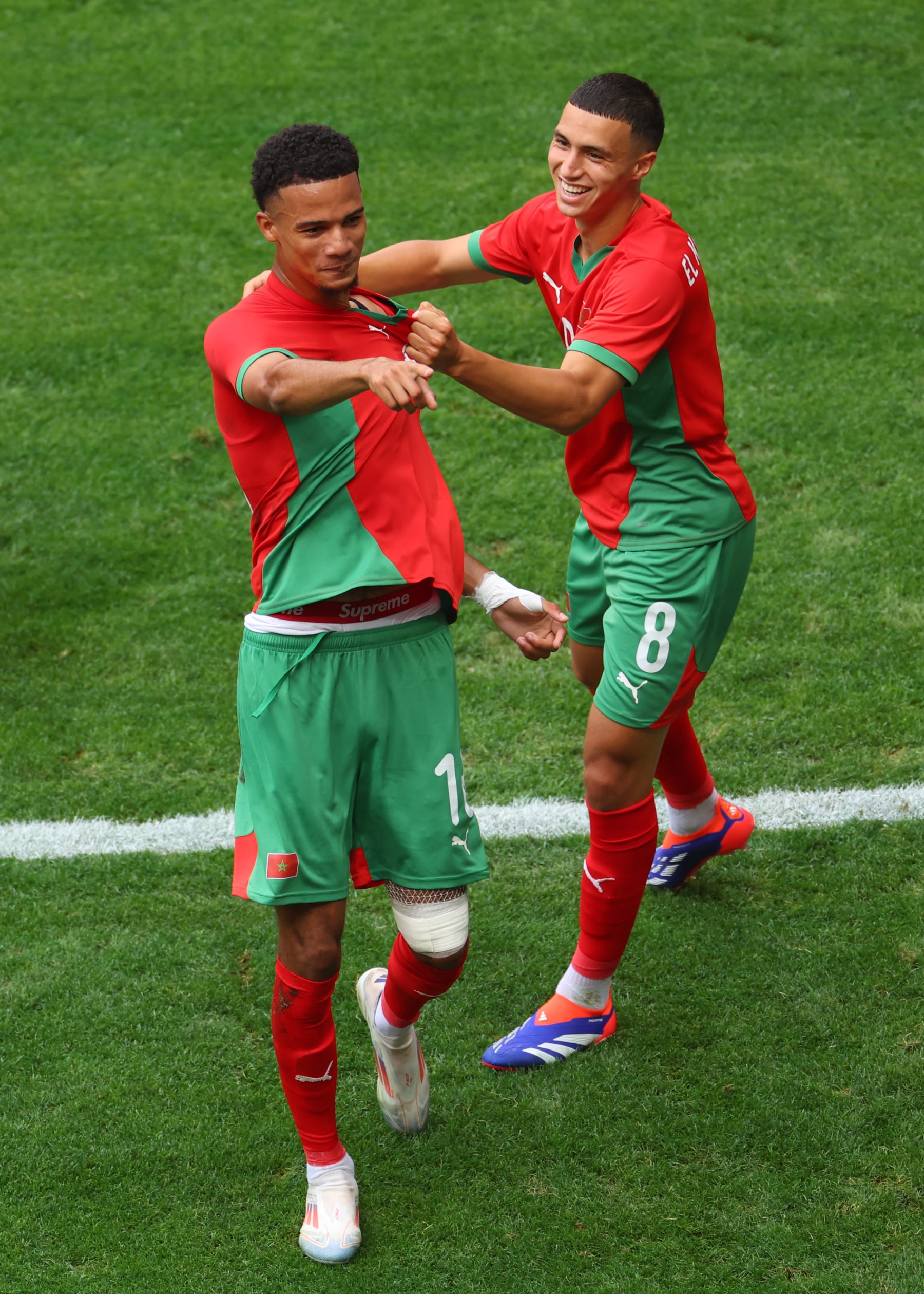 NICE, FRANCE - JULY 30: Amir Richardson #18 of Team Morocco celebrates scoring his team's first goal with teammate Bilal El Khannouss during the Men's group B match between Morocco and Iraq during the Olympic Games Paris 2024 at Stade de Nice on July 30, 2024 in Nice, France. (Photo by Marc Atkins/Getty Images)