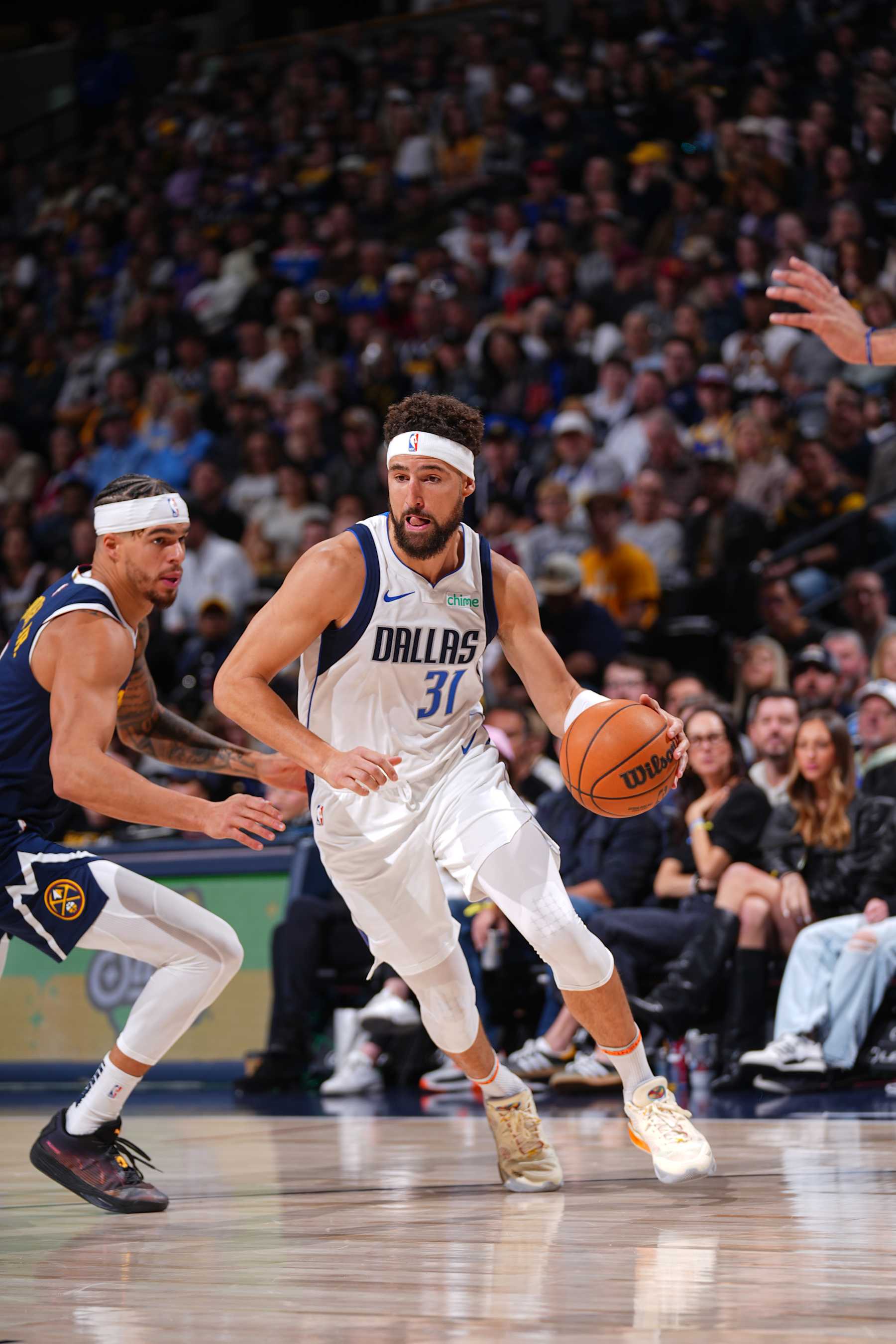 DENVER, CO - NOVEMBER 10: Klay Thompson #31 of the Dallas Mavericks drives to the basket during the game against the Denver Nuggets  during a regular season game on November 10, 2024 at Ball Arena in Denver, Colorado. NOTE TO USER: User expressly acknowledges and agrees that, by downloading and/or using this Photograph, user is consenting to the terms and conditions of the Getty Images License Agreement. Mandatory Copyright Notice: Copyright 2024 NBAE (Photo by Bart Young/NBAE via Getty Images)