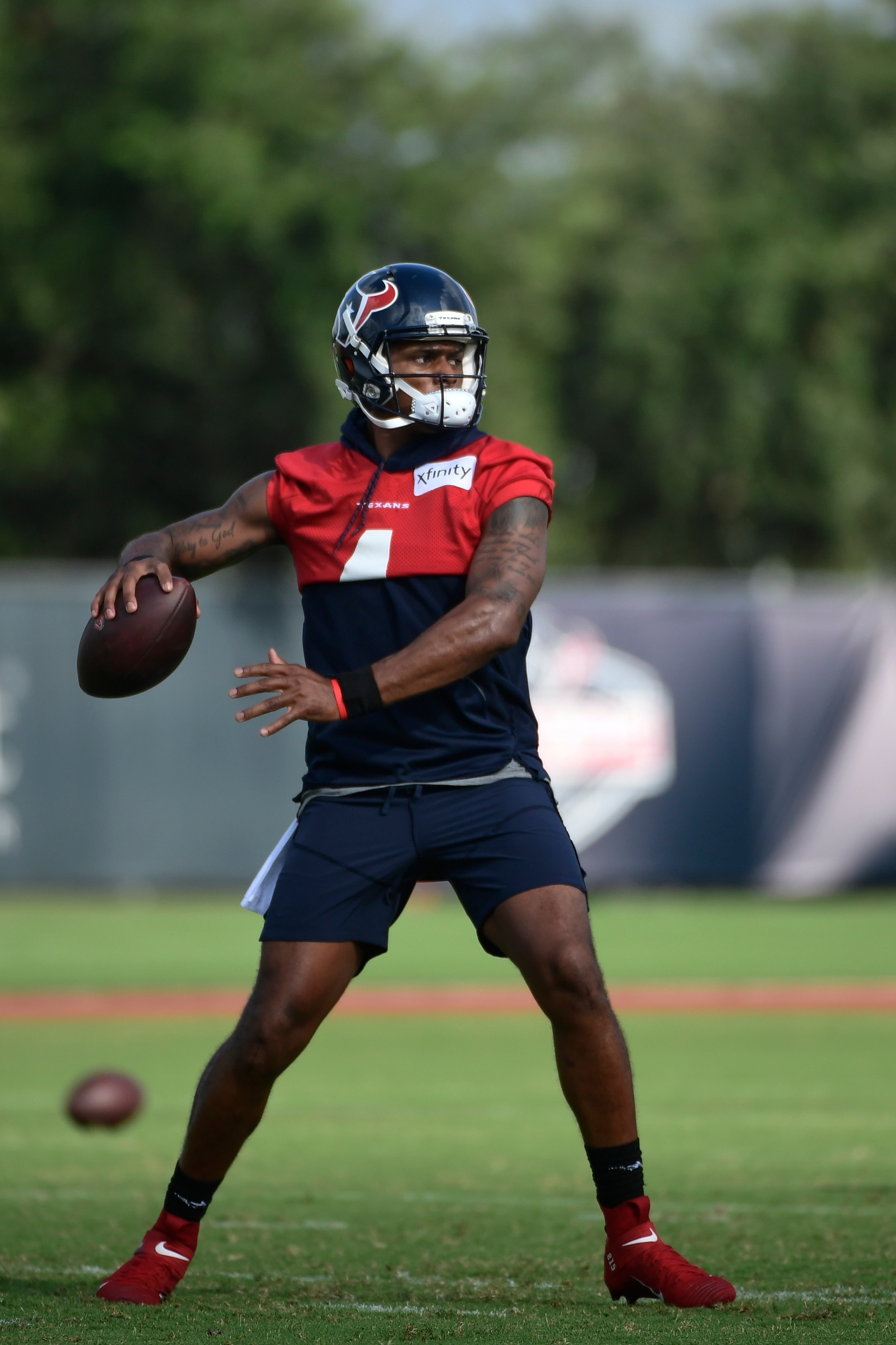 Texans quarterback Deshaun Watson (4) throws the ball during NFL football practice Monday, Aug. 2, 2021, in Houston. (AP Photo/Justin Rex)