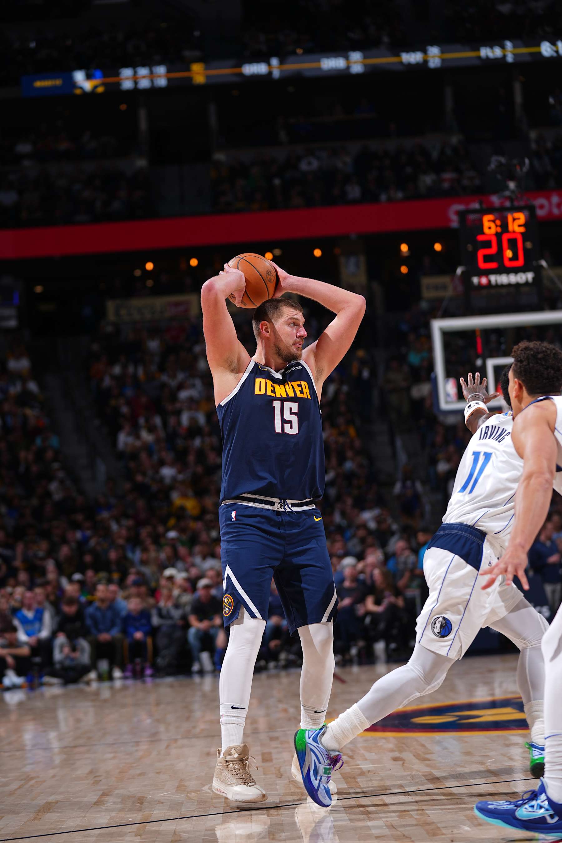 DENVER, CO - NOVEMBER 10:  Nikola Jokic #15 of the Denver Nuggets looks to pass the ball during the game against the Dallas Mavericks during a regular season game on November 10, 2024 at Ball Arena in Denver, Colorado. NOTE TO USER: User expressly acknowledges and agrees that, by downloading and/or using this Photograph, user is consenting to the terms and conditions of the Getty Images License Agreement. Mandatory Copyright Notice: Copyright 2024 NBAE (Photo by Bart Young/NBAE via Getty Images)