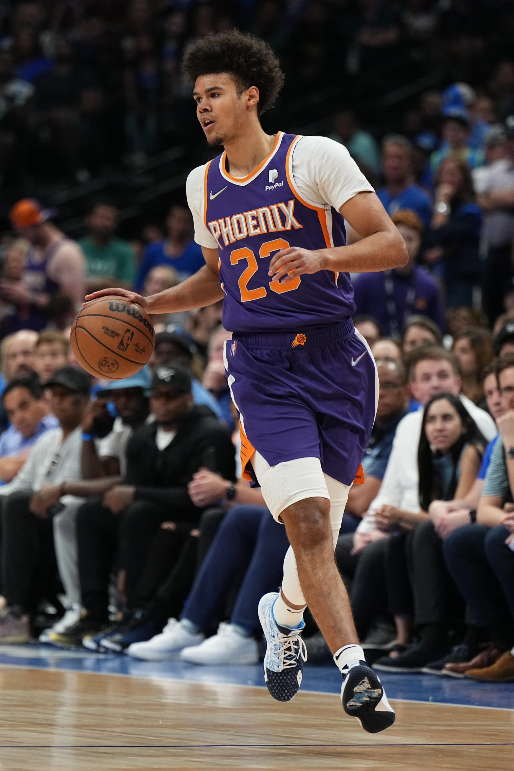 DALLAS, TX - MAY 6: Cameron Johnson #23 of the Phoenix Suns moves the ball against the Dallas Mavericks during Game 3 of the 2022 NBA Playoffs Western Conference Semifinals on May 6, 2022 at the American Airlines Center in Dallas, Texas. NOTE TO USER: User expressly acknowledges and agrees that, by downloading and or using this photograph, User is consenting to the terms and conditions of the Getty Images License Agreement. Mandatory Copyright Notice: Copyright 2022 NBAE (Photo by Glenn James/NBAE via Getty Images)