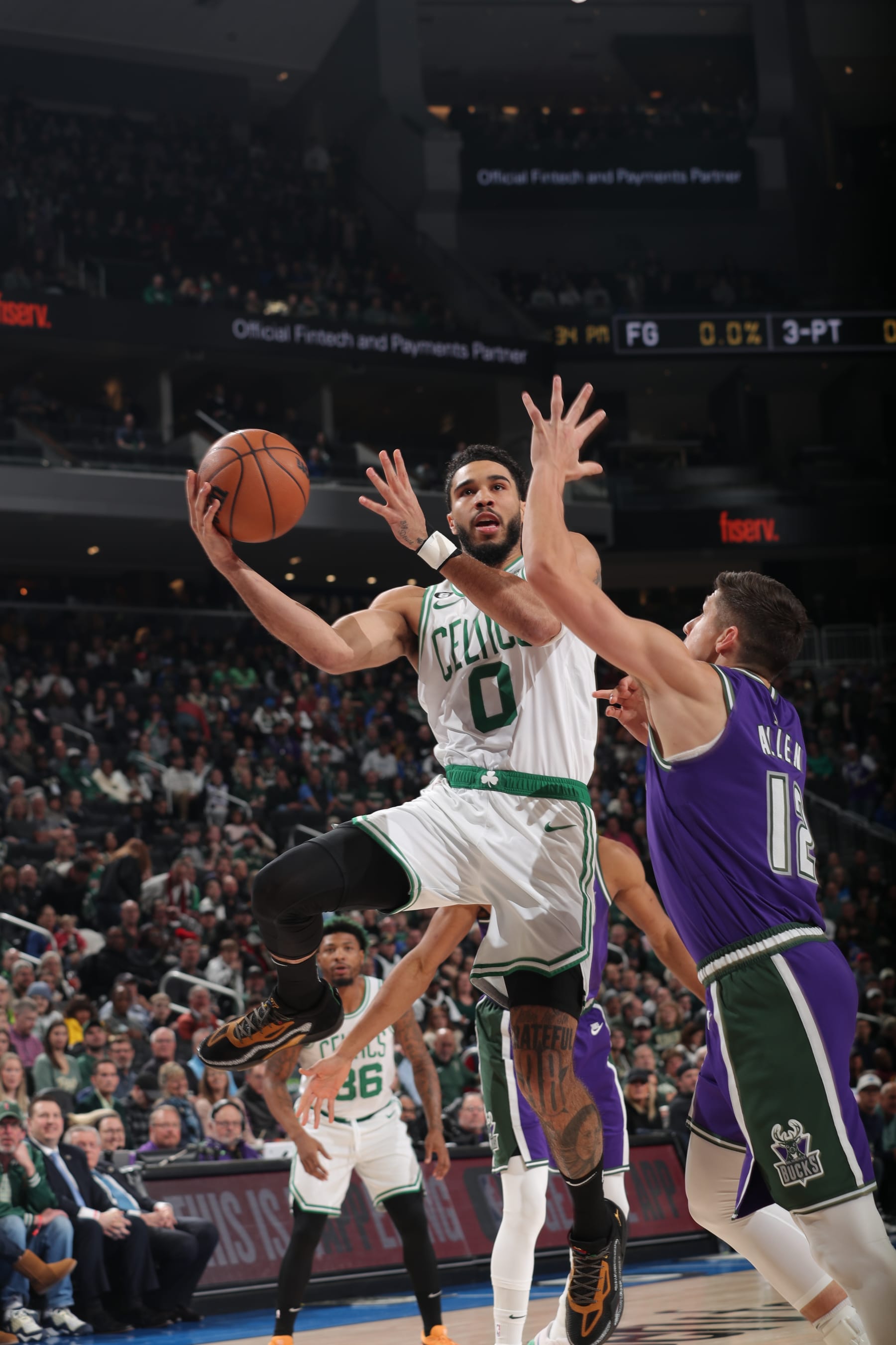 MILWAUKEE, WI - MARCH 30: Jayson Tatum #0 of the Boston Celtics drives to the basket during the game against the Milwaukee Bucks on March 30, 2023 at the Fiserv Forum Center in Milwaukee, Wisconsin. NOTE TO USER: User expressly acknowledges and agrees that, by downloading and or using this Photograph, user is consenting to the terms and conditions of the Getty Images License Agreement. Mandatory Copyright Notice: Copyright 2023 NBAE (Photo by Gary Dineen/NBAE via Getty Images).