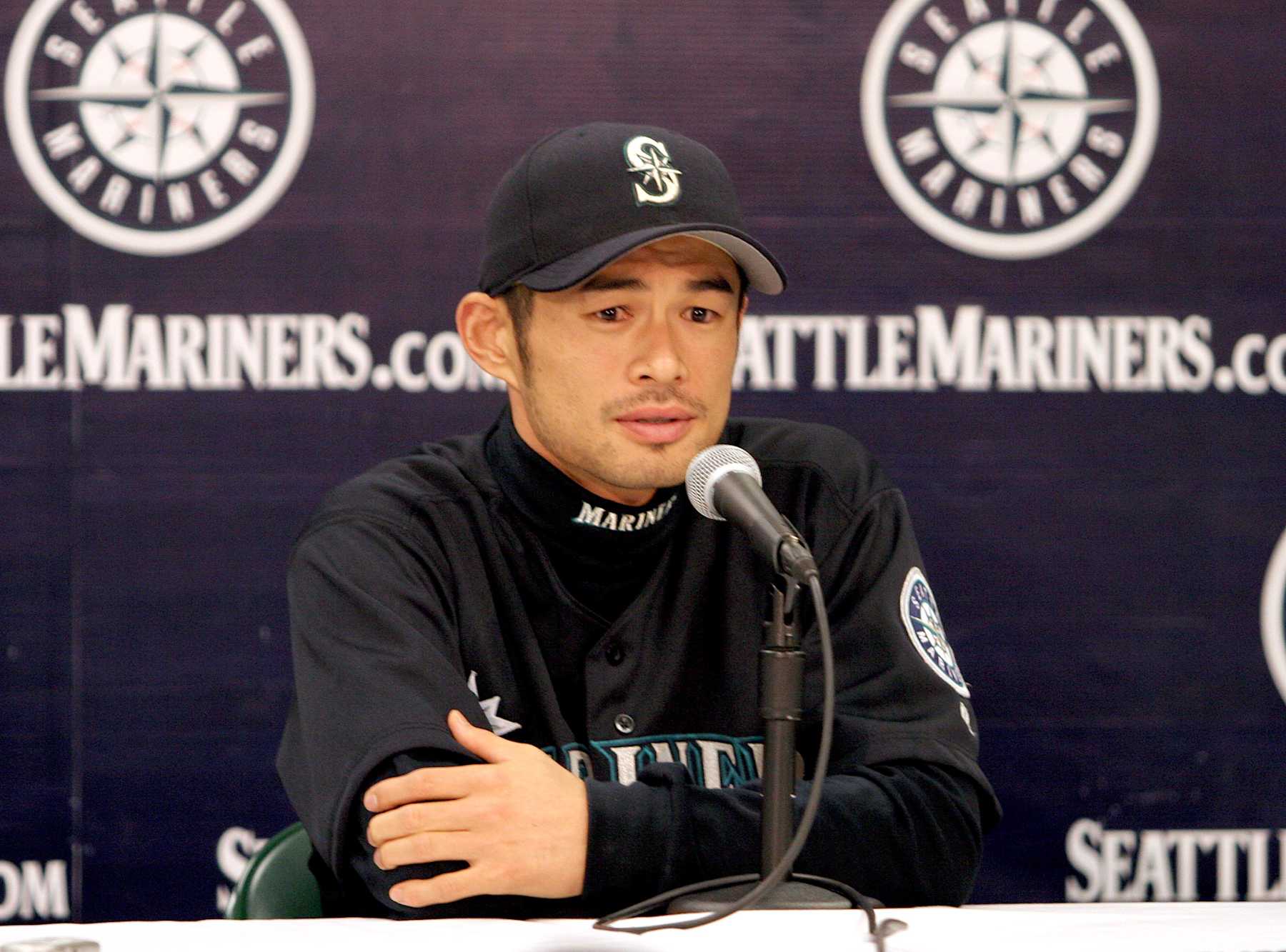 SEATTLE - OCTOBER 1:  Outfielder Ichiro Suzuki #51 of the Seattle Mariners talks to the press after Suzuki broke George Sisler's 84-year-old record for hits in a single season, during the game against the Texas Rangers on October 1, 2004 at Safeco Field in Seattle, Washington.  In the first inning, Ichiro tied the Major League record for most hits in a season and broke the record in the third inning with a single - his 258th hit of the season. In the sixth, Suzuki got hit number 259.  (Photo by Otto Greule Jr/Getty Images)