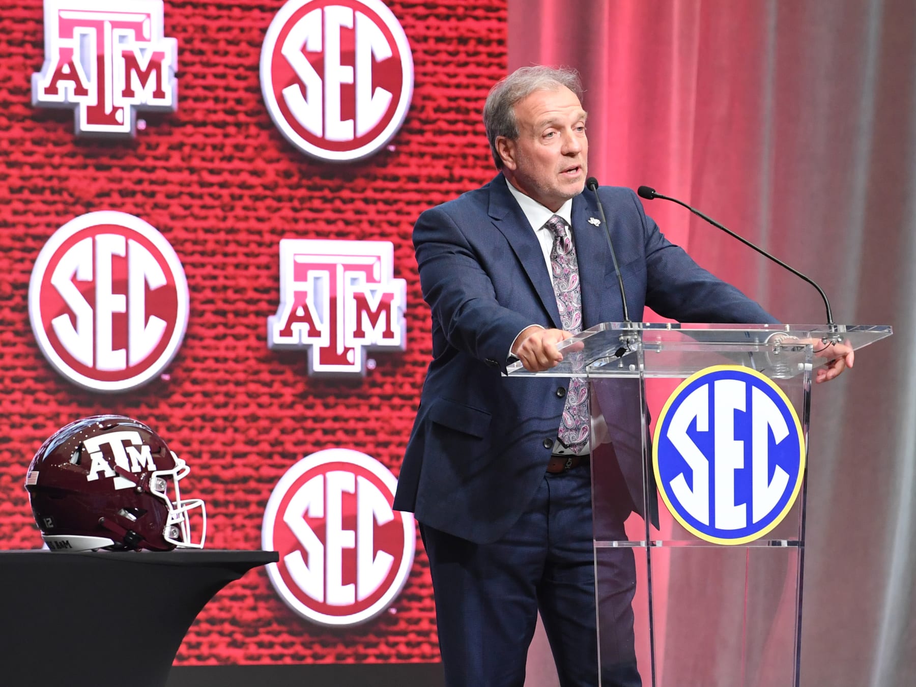 ATLANTA, GA - JULY 21: Texas A&M Aggies Head Coach Jimbo Fisher addresses the media during the SEC Football Kickoff Media Days on July 21, 2022, at the College Football Hall of Fame in Atlanta, GA.(Photo by Jeffrey Vest/Icon Sportswire via Getty Images)