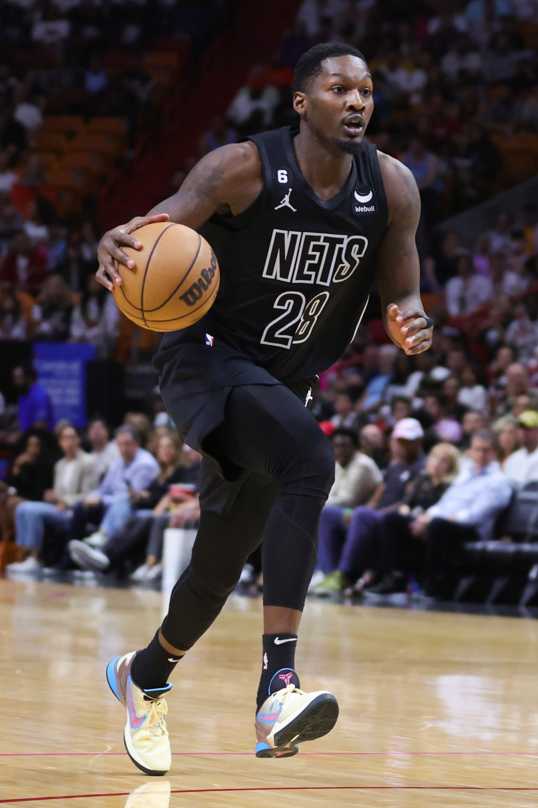 MIAMI, FLORIDA - MARCH 25: Dorian Finney-Smith #28 of the Brooklyn Nets in action against the Miami Heat during the first quarter at Miami-Dade Arena on March 25, 2023 in Miami, Florida. NOTE TO USER: User expressly acknowledges and agrees that, by downloading and or using this photograph, User is consenting to the terms and conditions of the Getty Images License Agreement.  (Photo by Megan Briggs/Getty Images)