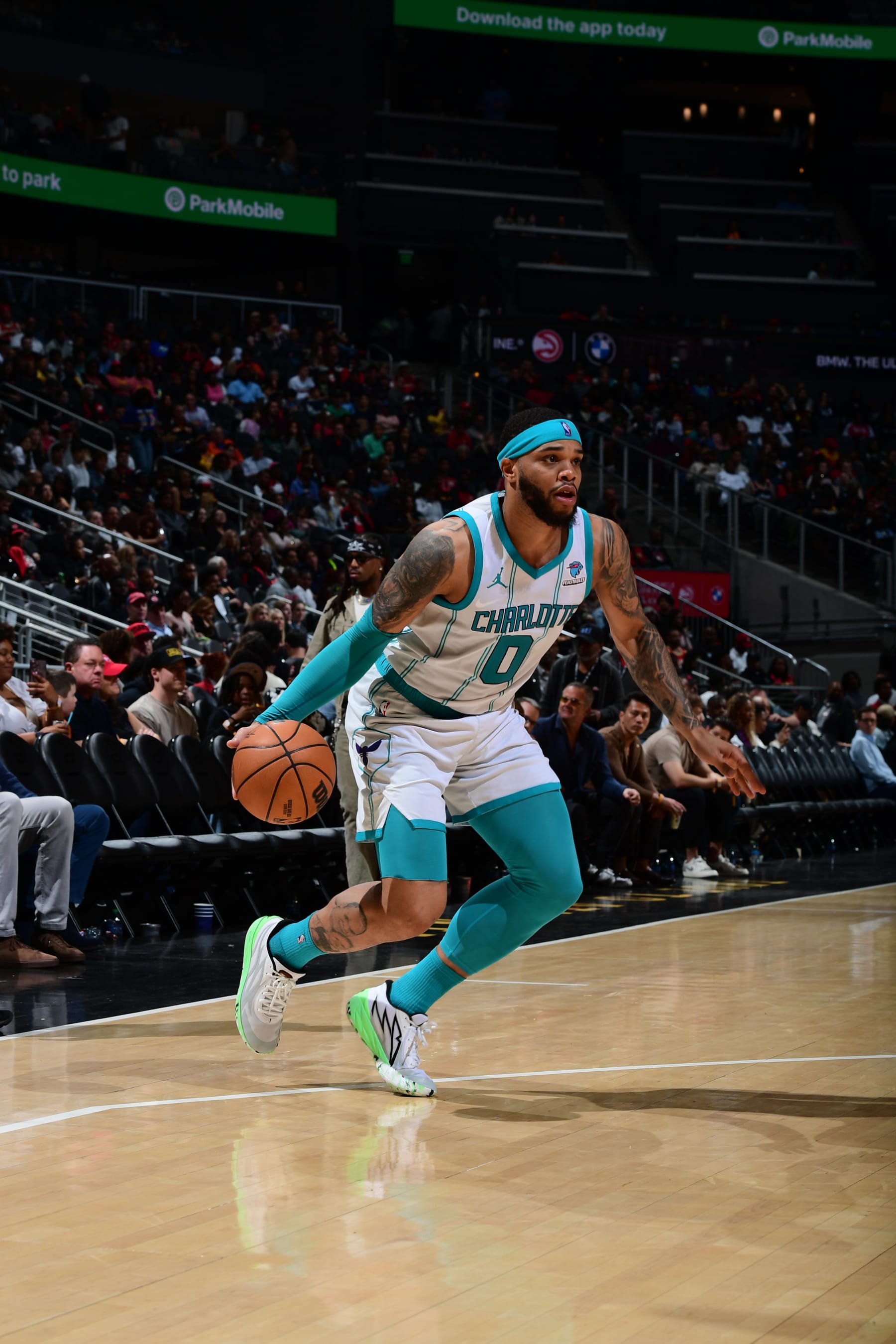 ATLANTA, GA - APRIL 10: Miles Bridges #0 of the Charlotte Hornets handles the ball during the game against the Atlanta Hawks on April 10, 2024 at State Farm Arena in Atlanta, Georgia.  NOTE TO USER: User expressly acknowledges and agrees that, by downloading and/or using this Photograph, user is consenting to the terms and conditions of the Getty Images License Agreement. Mandatory Copyright Notice: Copyright 2024 NBAE (Photo by Scott Cunningham/NBAE via Getty Images)