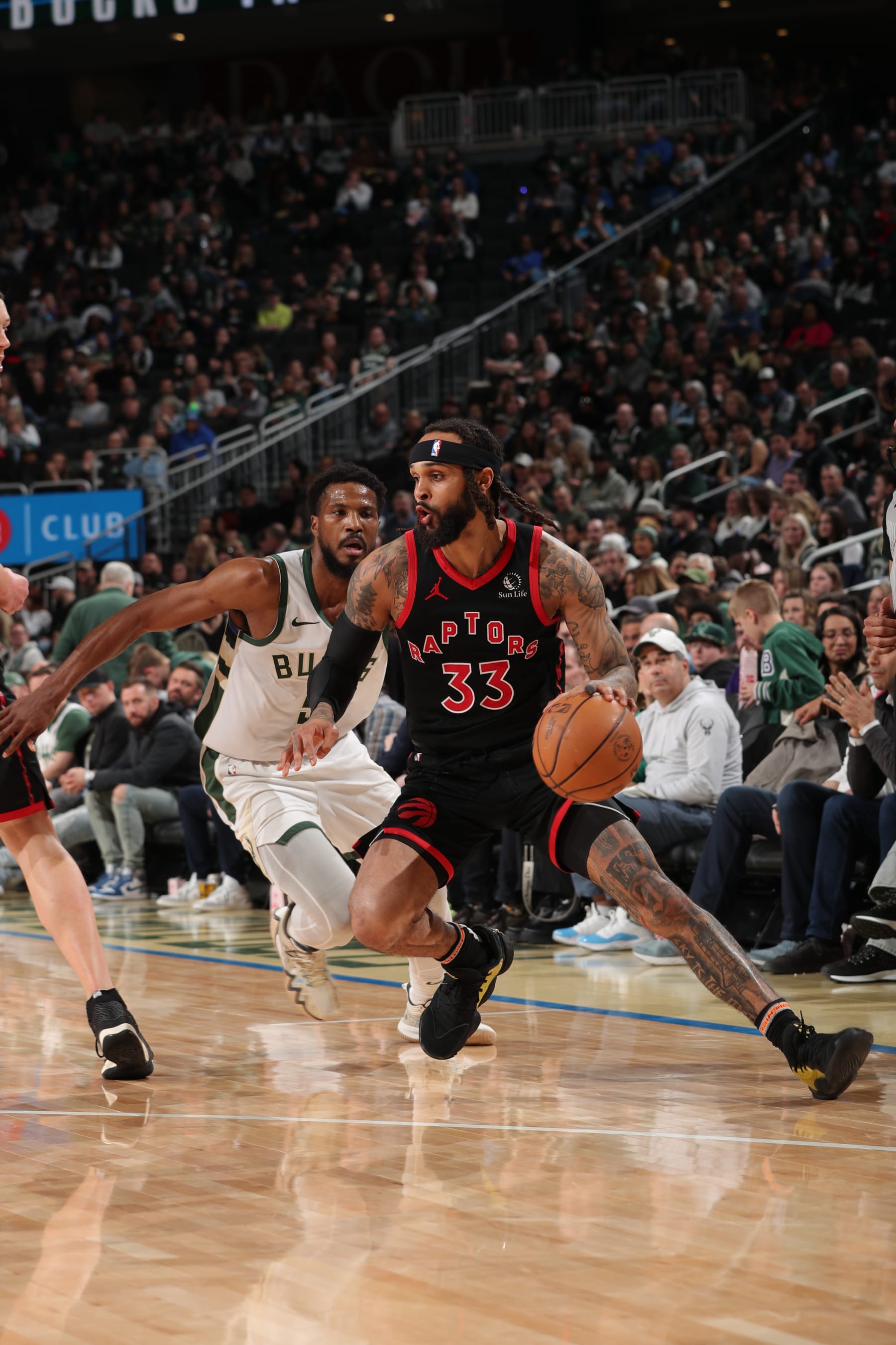 MILWAUKEE, WI - APRIL 5: Gary Trent Jr. #33 of the Toronto Raptors handles the ball during the game against the Milwaukee Bucks on April 5, 2024 at the Fiserv Forum Center in Milwaukee, Wisconsin. NOTE TO USER: User expressly acknowledges and agrees that, by downloading and or using this Photograph, user is consenting to the terms and conditions of the Getty Images License Agreement. Mandatory Copyright Notice: Copyright 2024 NBAE (Photo by Gary Dineen/NBAE via Getty Images).