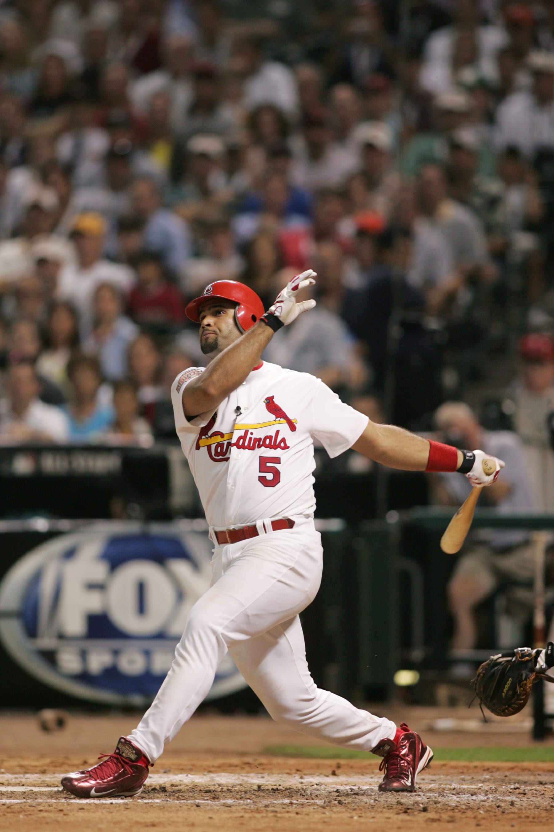 HOUSTON - JULY 13:  National League All-Star Albert Pujols #5 of the St. Louis Cardinals doubles in the fourth inning during the Major League Baseball All-Star Game at Minute Maid Park on July 13, 2004 in Houston, Texas.  The National League defeated the American League 9-4. (Photo by MLB via Getty Images)