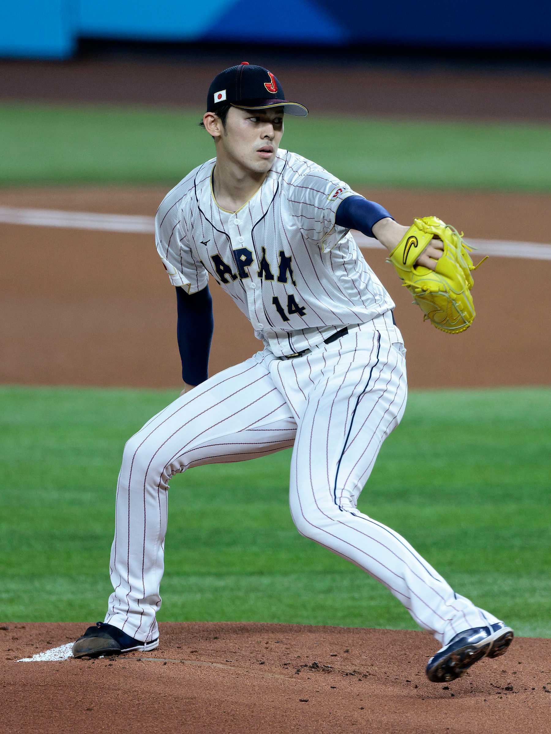 MIAMI, FL - MARCH 20: Roki Sasaki #14 of Team Japan pitches during the 2023 World Baseball Classic Semifinal game against Team Mexico at loanDepot Park on March 20, 2023 in Miami, Florida. (Photo by Christopher Pasatieri/Getty Images)