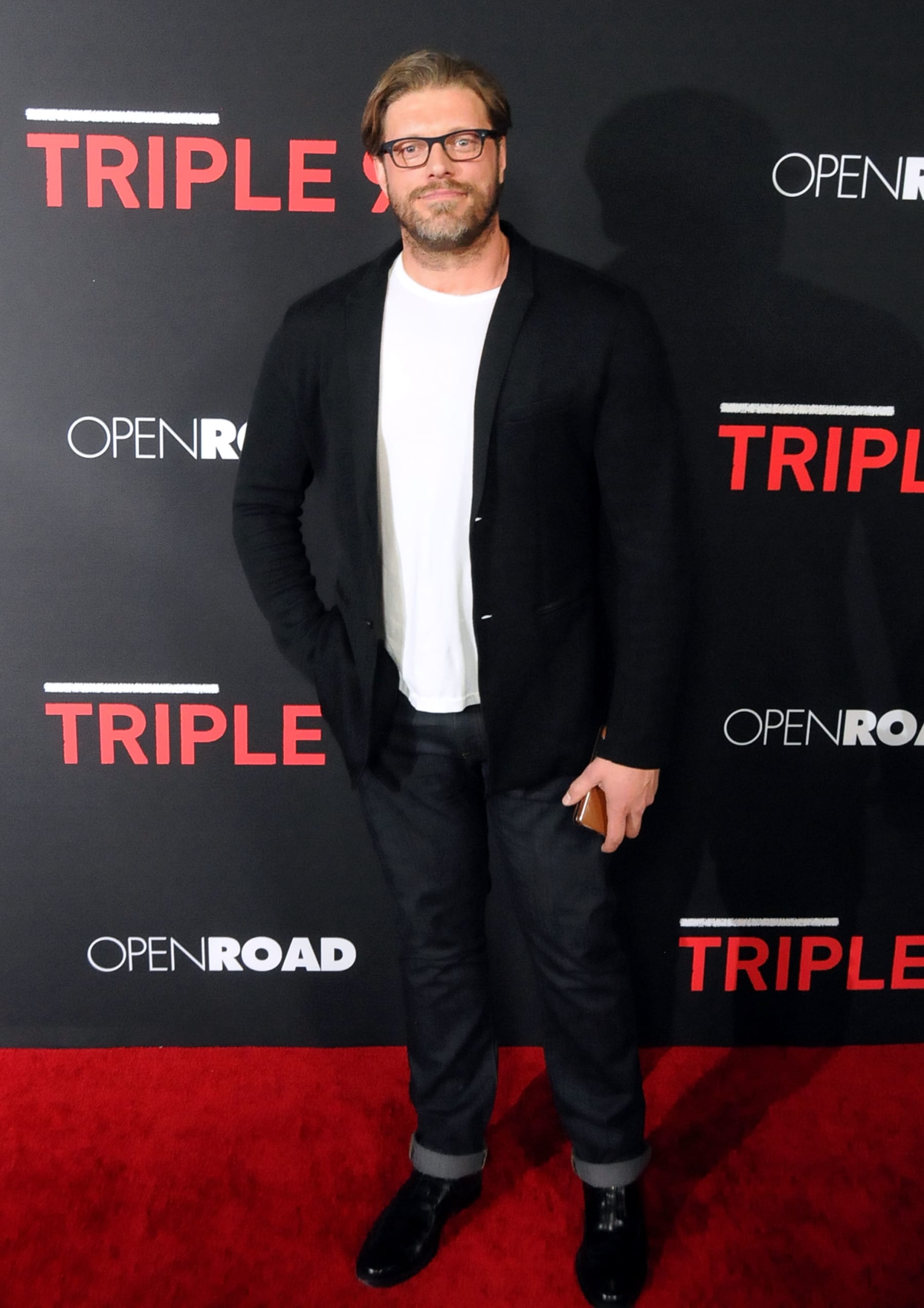 LOS ANGELES, CA - FEBRUARY 16:  Actor/former WWE wrestler Adam "Edge" Copeland attends the Premiere of Open Road's 'Triple 9' at Regal Cinemas L.A. Live on February 16, 2016 in Los Angeles, California.  (Photo by Barry King/Getty Images)