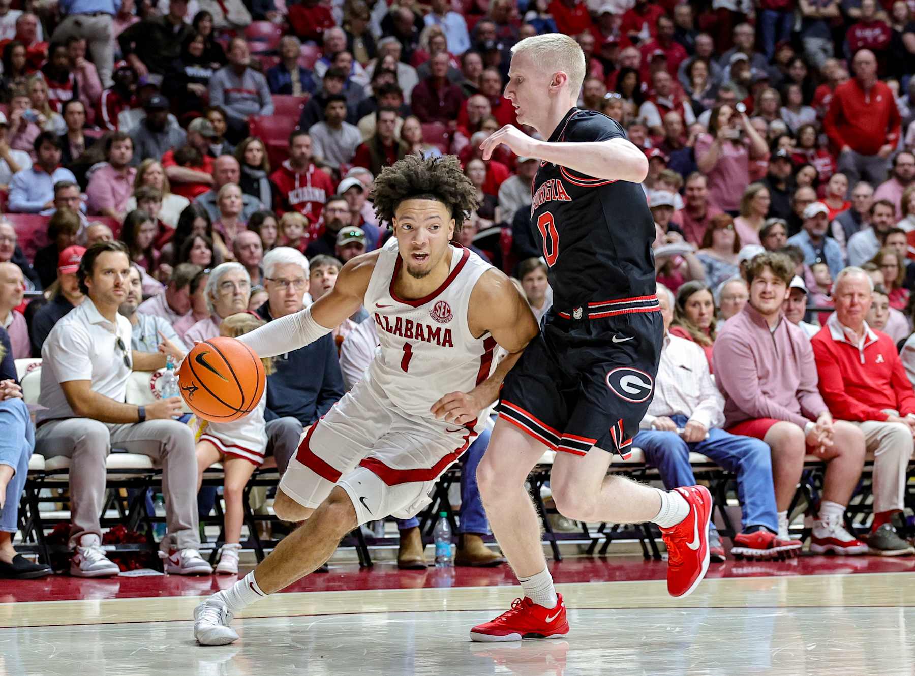 TUSCALOOSA, ALABAMA - FEBRUARY 1: Mark Sears #1 of the Alabama Crimson Tide drives to the basket during the second half against Dakota Leffew #1 of the Georgia Bulldogs at Coleman Coliseum on February 1, 2025 in Tuscaloosa, Alabama. (Photo by Brandon Sumrall/Getty Images)
