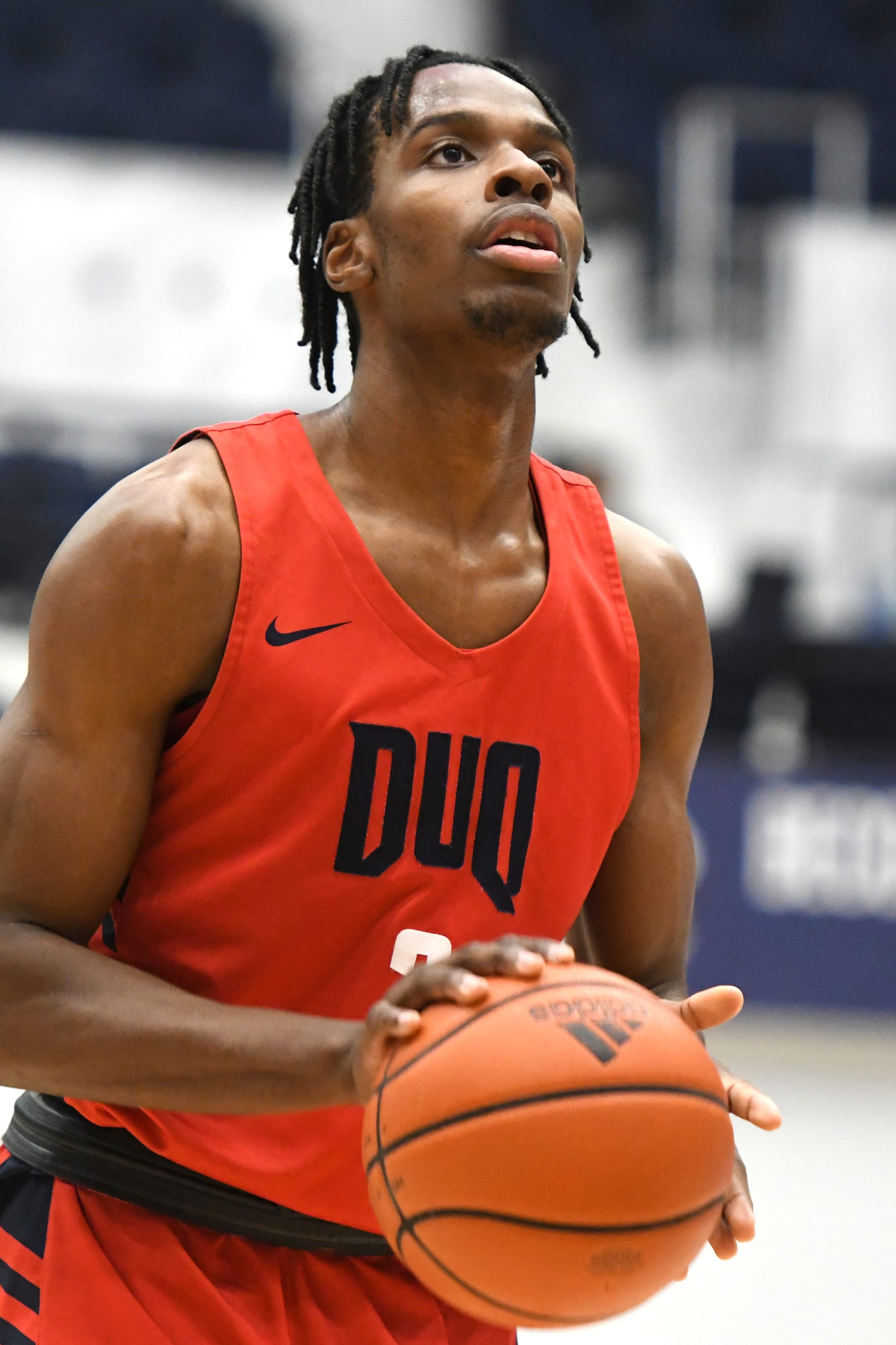 WASHINGTON, DC - MARCH 02:  Toby Okani #2 of the Duquesne Dukes takes a foul shot during a college basketball game against the George Washington Colonials at the Smith Center on March 2, 2022 in Washington, DC.  (Photo by Mitchell Layton/Getty Images)