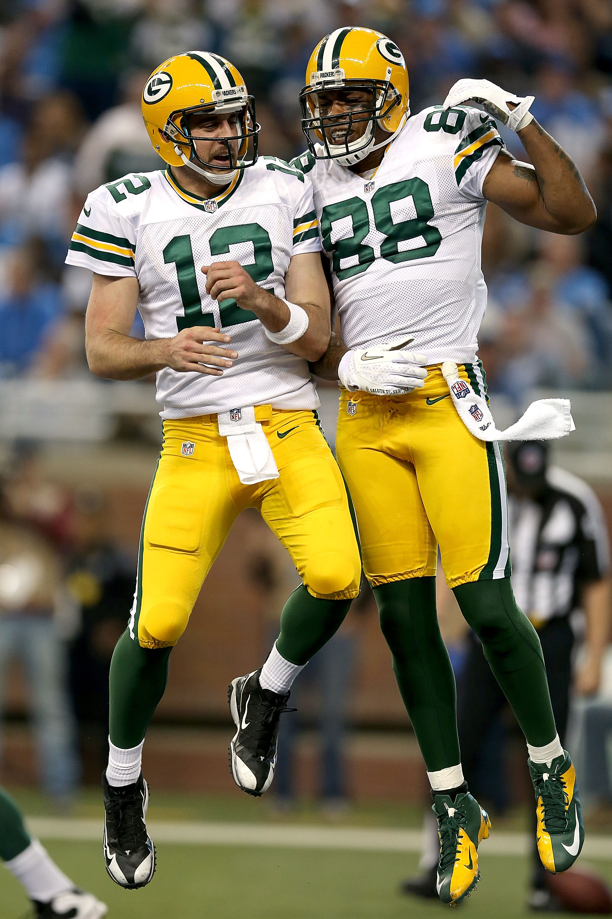 DETROIT, MI - NOVEMBER 18:  Aaron Rodgers #12 and Jermichael Finley #88 of the Green Bay Packers celebrate a Finley touchdown against the Detroit Lions at Ford Field on November 18, 2012 in Detroit, Michigan.  (Photo by Matthew Stockman/Getty Images)
