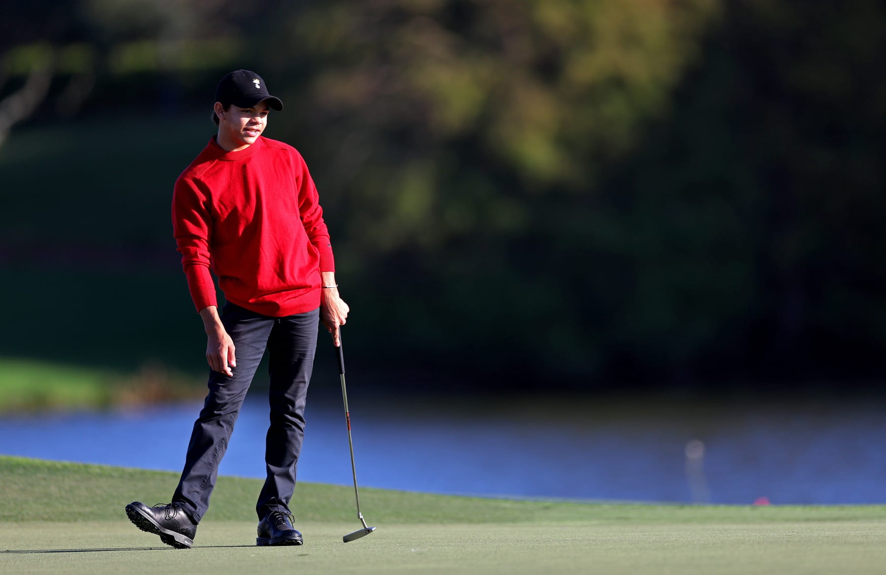 ORLANDO, FLORIDA - DECEMBER 18:  Charlie Woods looks on  during the final round of the PNC Championship at Ritz-Carlton Golf Club on December 18, 2022 in Orlando, Florida. (Photo by Mike Ehrmann/Getty Images)