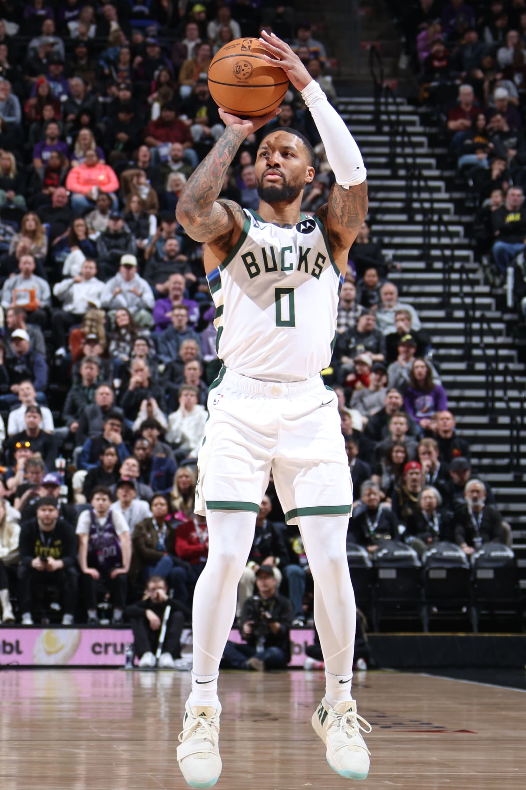SALT LAKE CITY, UT - FEBRUARY 4: Damian Lillard #0 of the Milwaukee Bucks shoots a three point basket during the game against the Utah Jazz on February 4, 2024 at Delta Center in Salt Lake City, Utah. NOTE TO USER: User expressly acknowledges and agrees that, by downloading and or using this Photograph, User is consenting to the terms and conditions of the Getty Images License Agreement. Mandatory Copyright Notice: Copyright 2024 NBAE (Photo by Melissa Majchrzak/NBAE via Getty Images)