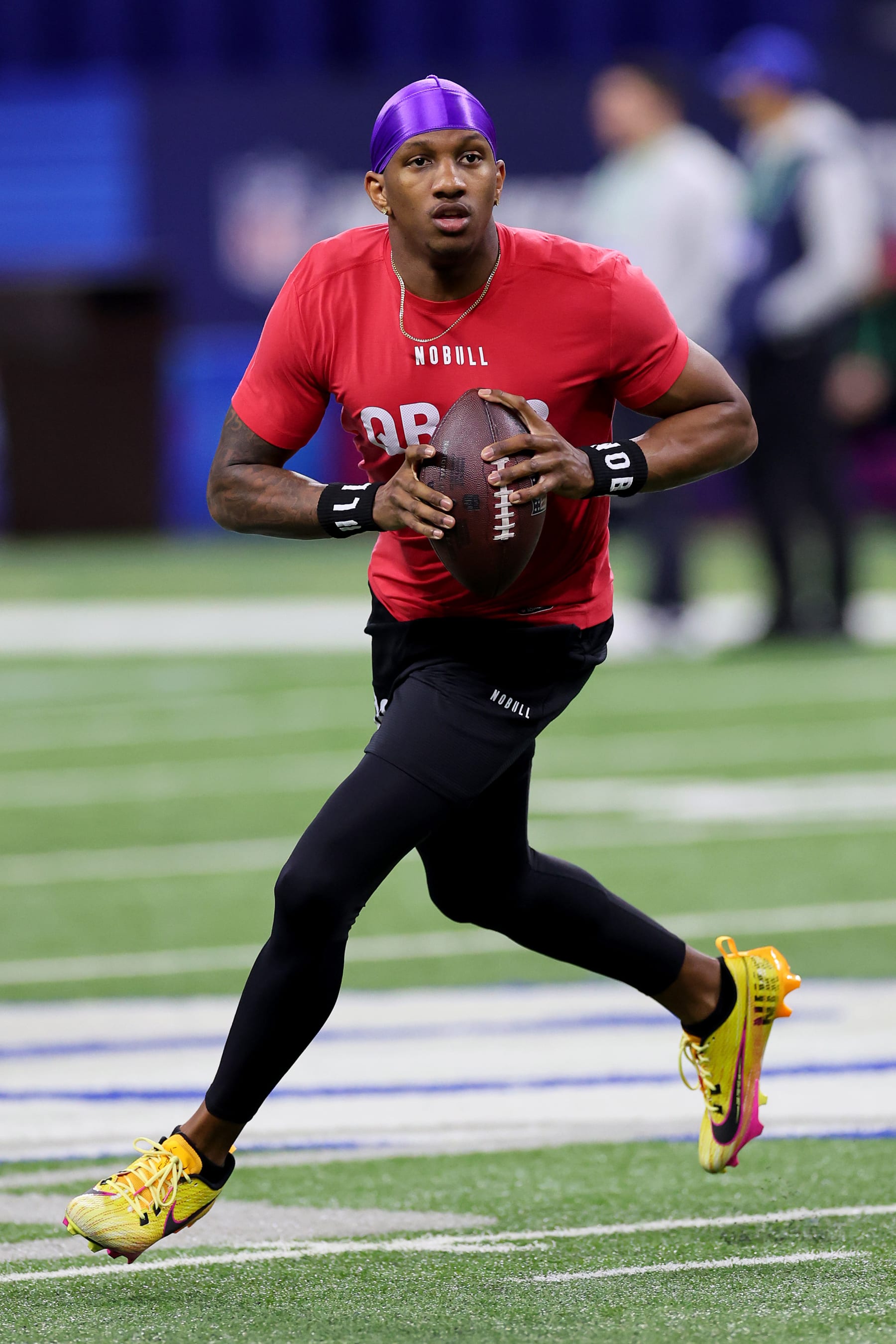 INDIANAPOLIS, INDIANA - MARCH 02: Michael Penix #QB08 of Washington participates in a drill during the NFL Combine at Lucas Oil Stadium on March 02, 2024 in Indianapolis, Indiana. (Photo by Stacy Revere/Getty Images)
