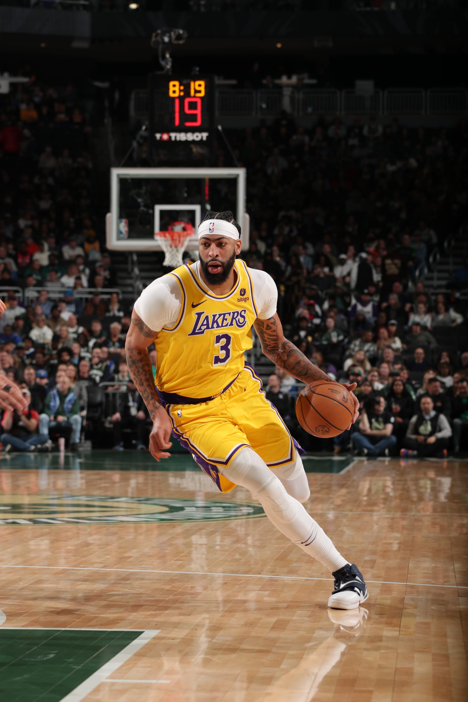 MILWAUKEE, WI - MARCH 26: Anthony Davis #3 of the Los Angeles Lakers drives to the basket during the game against the Milwaukee Bucks on March 26, 2024 at the Fiserv Forum Center in Milwaukee, Wisconsin. NOTE TO USER: User expressly acknowledges and agrees that, by downloading and or using this Photograph, user is consenting to the terms and conditions of the Getty Images License Agreement. Mandatory Copyright Notice: Copyright 2024 NBAE (Photo by Gary Dineen/NBAE via Getty Images).