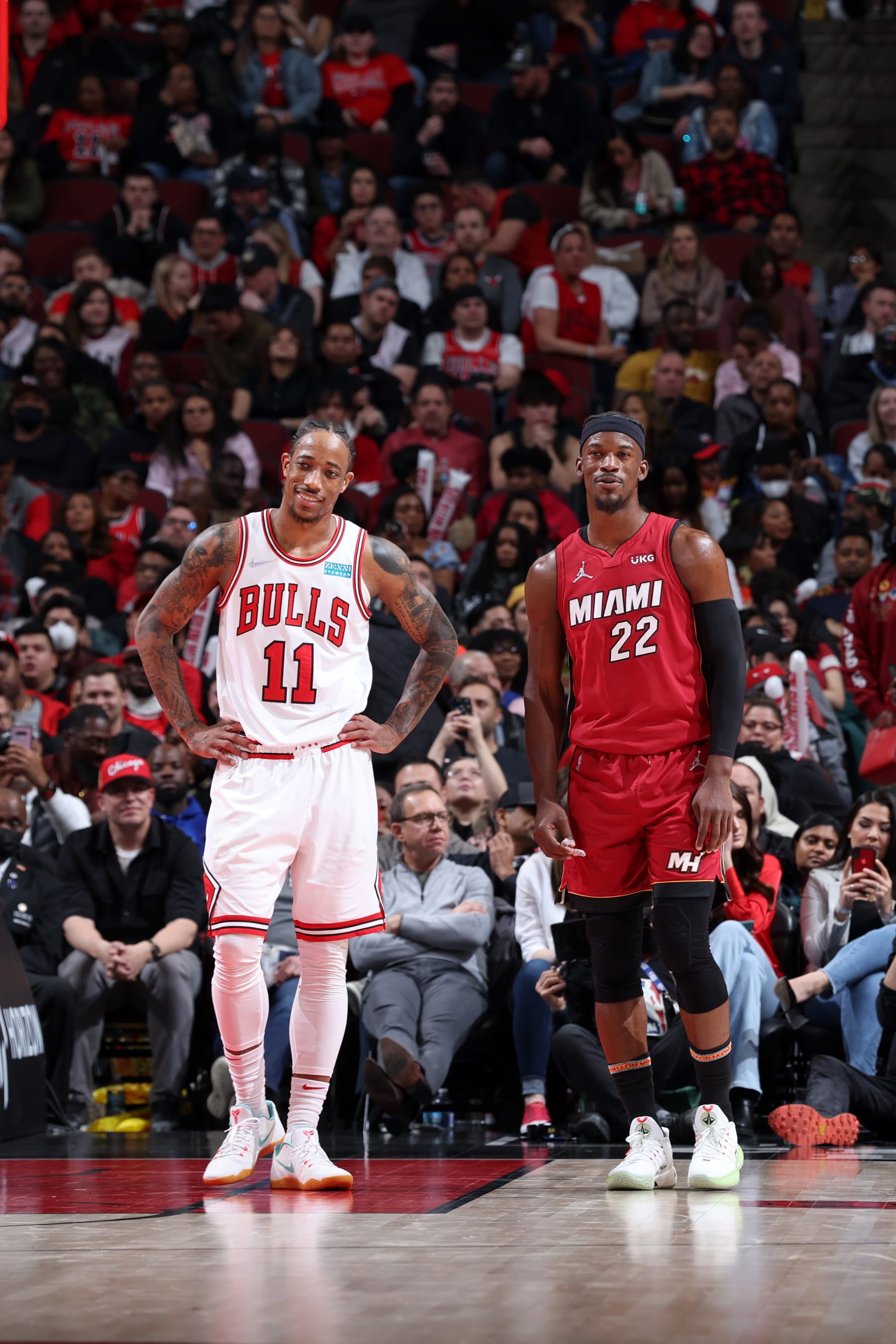 CHICAGO, IL - APRIL 2: DeMar DeRozan #11 of the Chicago Bulls and Jimmy Butler #22 of the Miami Heat talk during the game on April 2, 2022 at United Center in Chicago, Illinois. NOTE TO USER: User expressly acknowledges and agrees that, by downloading and or using this photograph, User is consenting to the terms and conditions of the Getty Images License Agreement. Mandatory Copyright Notice: Copyright 2022 NBAE (Photo by Jeff Haynes/NBAE via Getty Images) CHICAGO, IL - APRIL 2: DeMar DeRozan #11 of the Chicago Bulls and Jimmy Butler #22 of the Miami Heat talk during the game on April 2, 2022 at United Center in Chicago, Illinois. NOTE TO USER: User expressly acknowledges and agrees that, by downloading and or using this photograph, User is consenting to the terms and conditions of the Getty Images License Agreement. Mandatory Copyright Notice: Copyright 2022 NBAE (Photo by Jeff Haynes/NBAE via Getty Images)