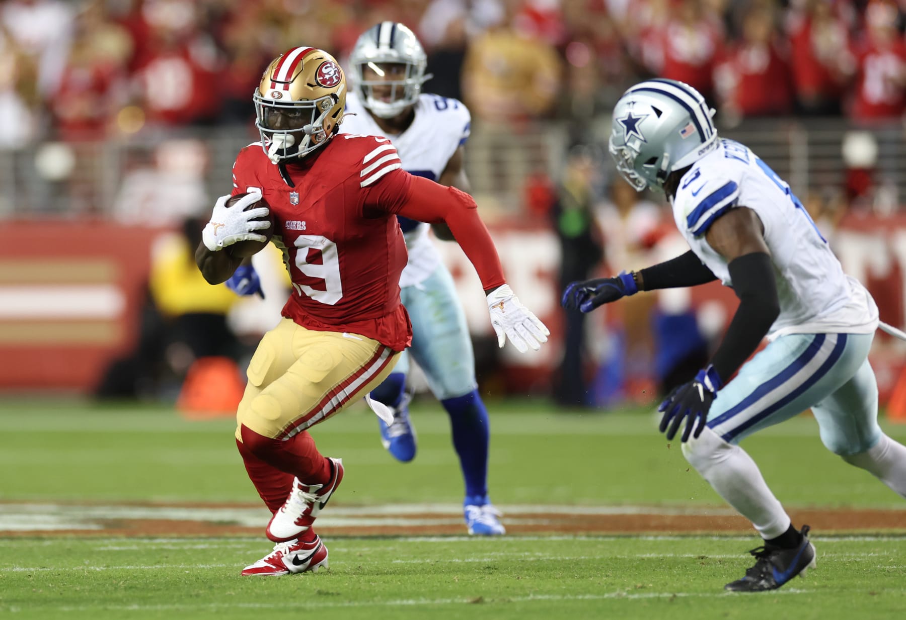 SANTA CLARA, CALIFORNIA - OCTOBER 08: Deebo Samuel #19 of the San Francisco 49ers runs after a catch during the third quarter against the Dallas Cowboys at Levi's Stadium on October 08, 2023 in Santa Clara, California. (Photo by Ezra Shaw/Getty Images)