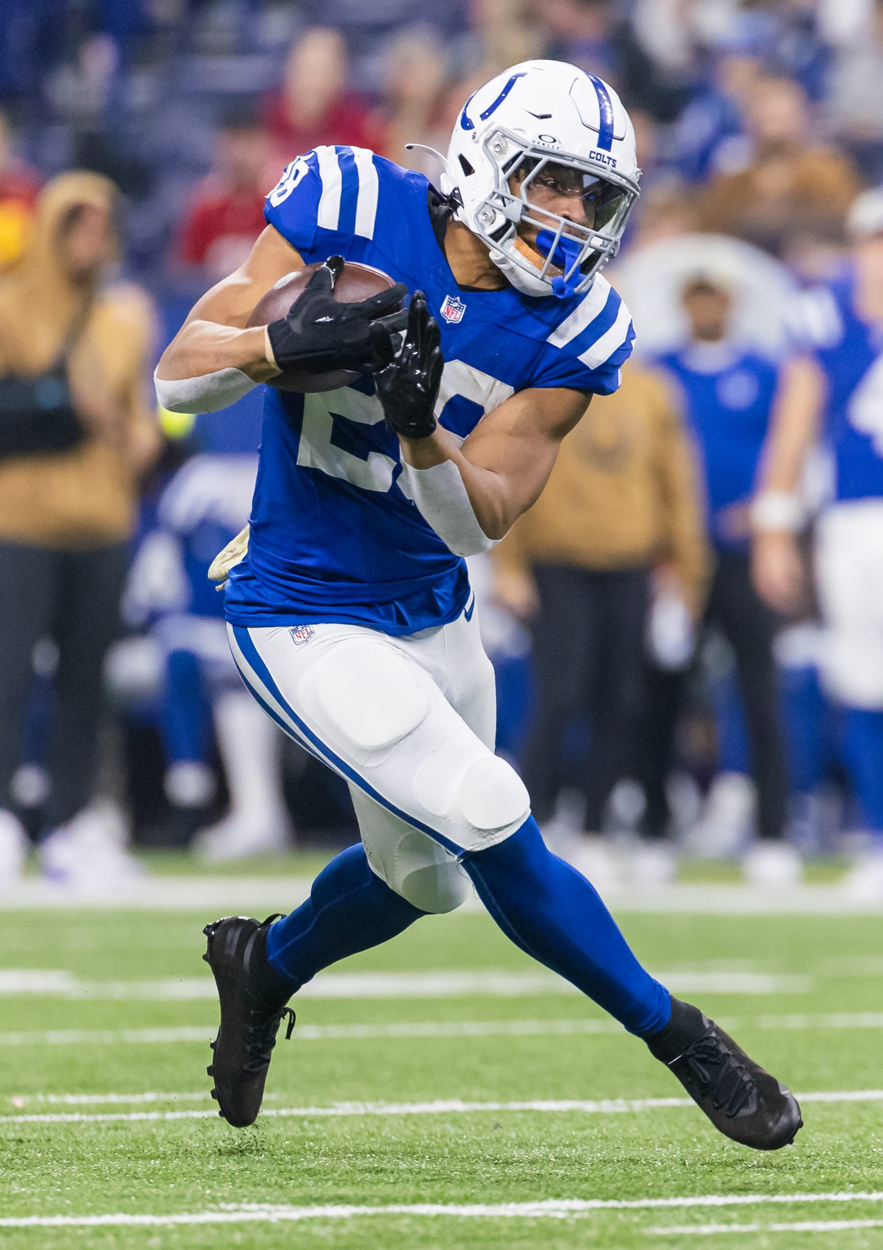 INDIANAPOLIS, INDIANA - NOVEMBER 26: Jonathan Taylor #28 of the Indianapolis Colts runs the ball during the game against the Tampa Bay Buccaneers at Lucas Oil Stadium on November 26, 2023 in Indianapolis, Indiana. (Photo by Michael Hickey/Getty Images)