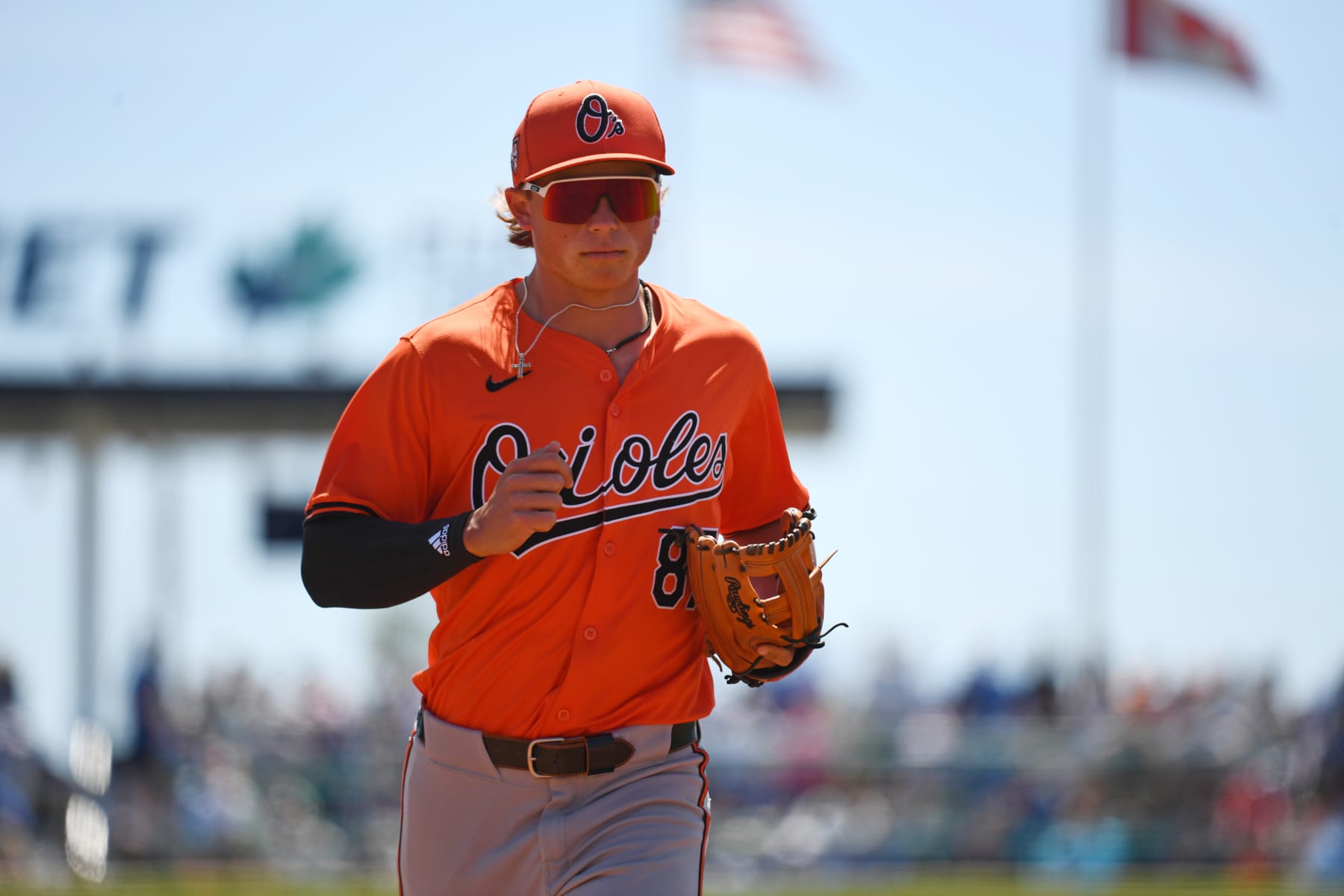 DUNEDIN, FLORIDA - MARCH 19, 2024: Jackson Holliday #87 of the Baltimore Orioles runs off the field after the second inning of a spring training game against the Toronto Blue Jays at TD Ballpark on March 19, 2024 in Dunedin, Florida. (Photo by George Kubas/Diamond Images via Getty Images)