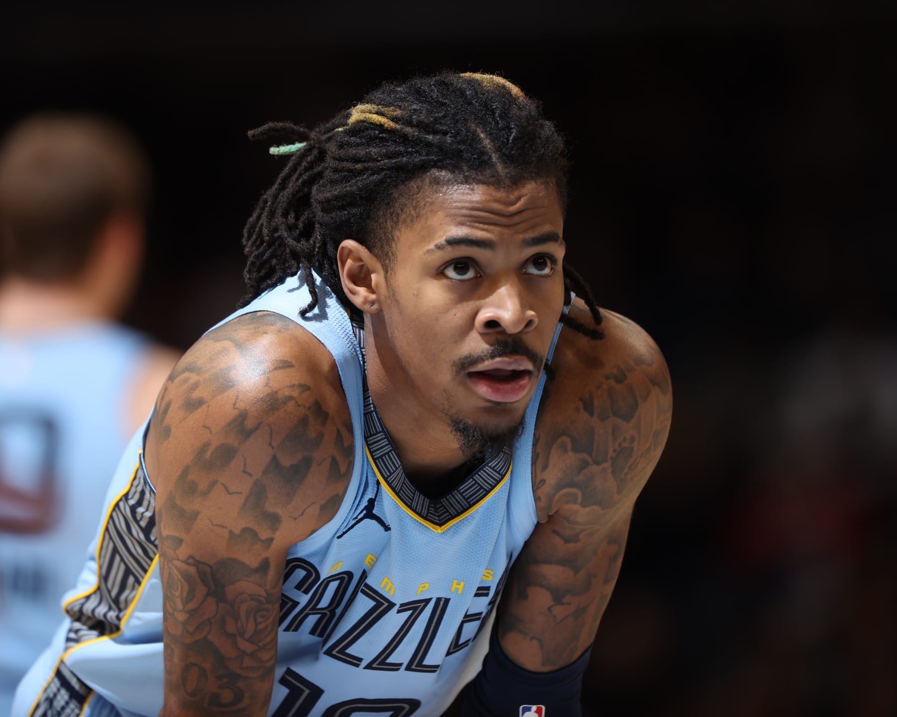 MEMPHIS, TN - JANUARY 2:  Ja Morant #12 of the Memphis Grizzlies looks on during the game on January 2, 2024 at FedExForum in Memphis, Tennessee. NOTE TO USER: User expressly acknowledges and agrees that, by downloading and or using this photograph, User is consenting to the terms and conditions of the Getty Images License Agreement. Mandatory Copyright Notice: Copyright 2024 NBAE (Photo by Joe Murphy/NBAE via Getty Images)