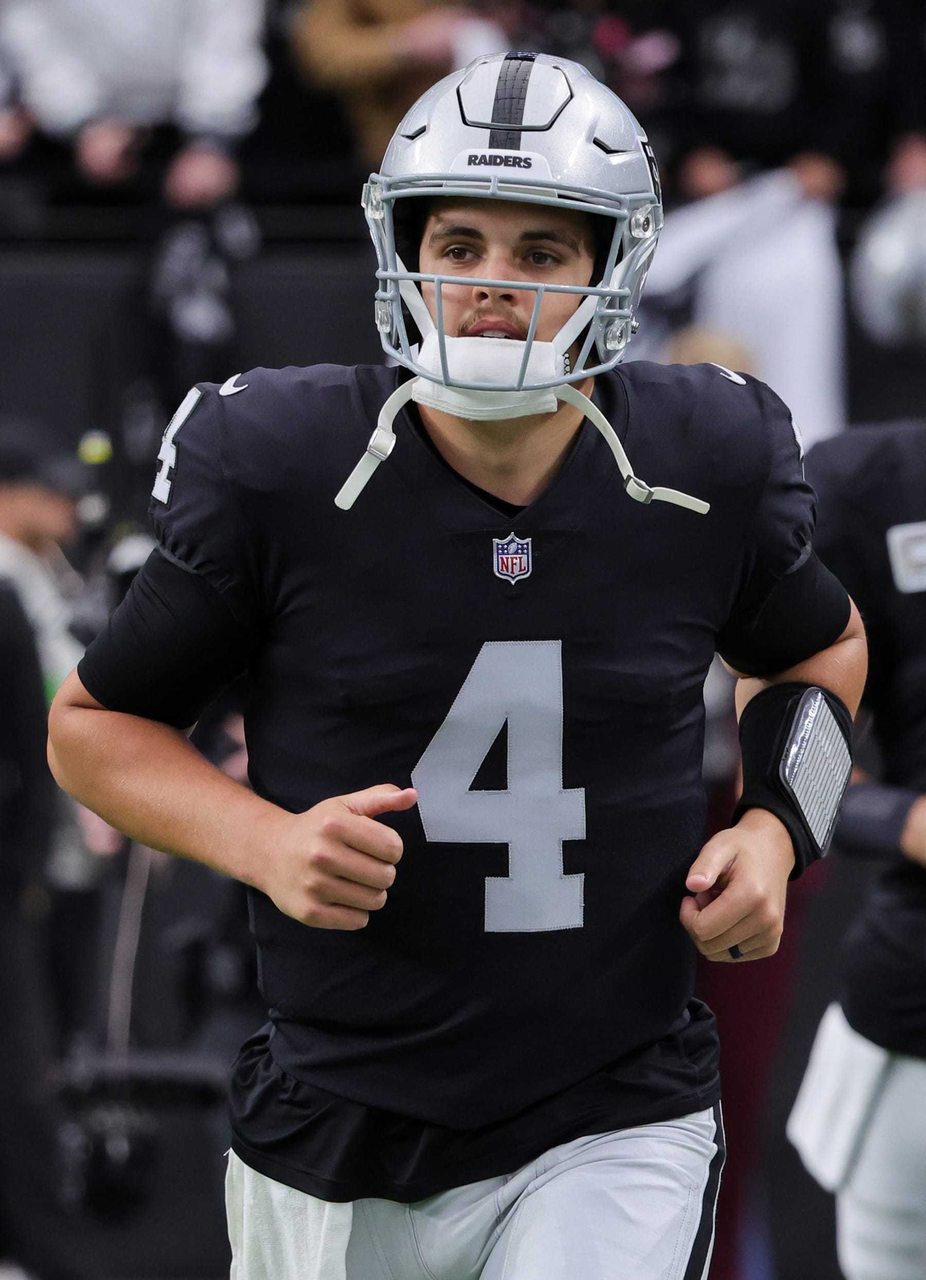 LAS VEGAS, NEVADA - JANUARY 07: Quarterback Aidan O'Connell #4 of the Las Vegas Raiders runs onto the field for warmups before a game against the Denver Broncos at Allegiant Stadium on January 07, 2024 in Las Vegas, Nevada. The Raiders defeated the Broncos 27-14. (Photo by Ethan Miller/Getty Images)