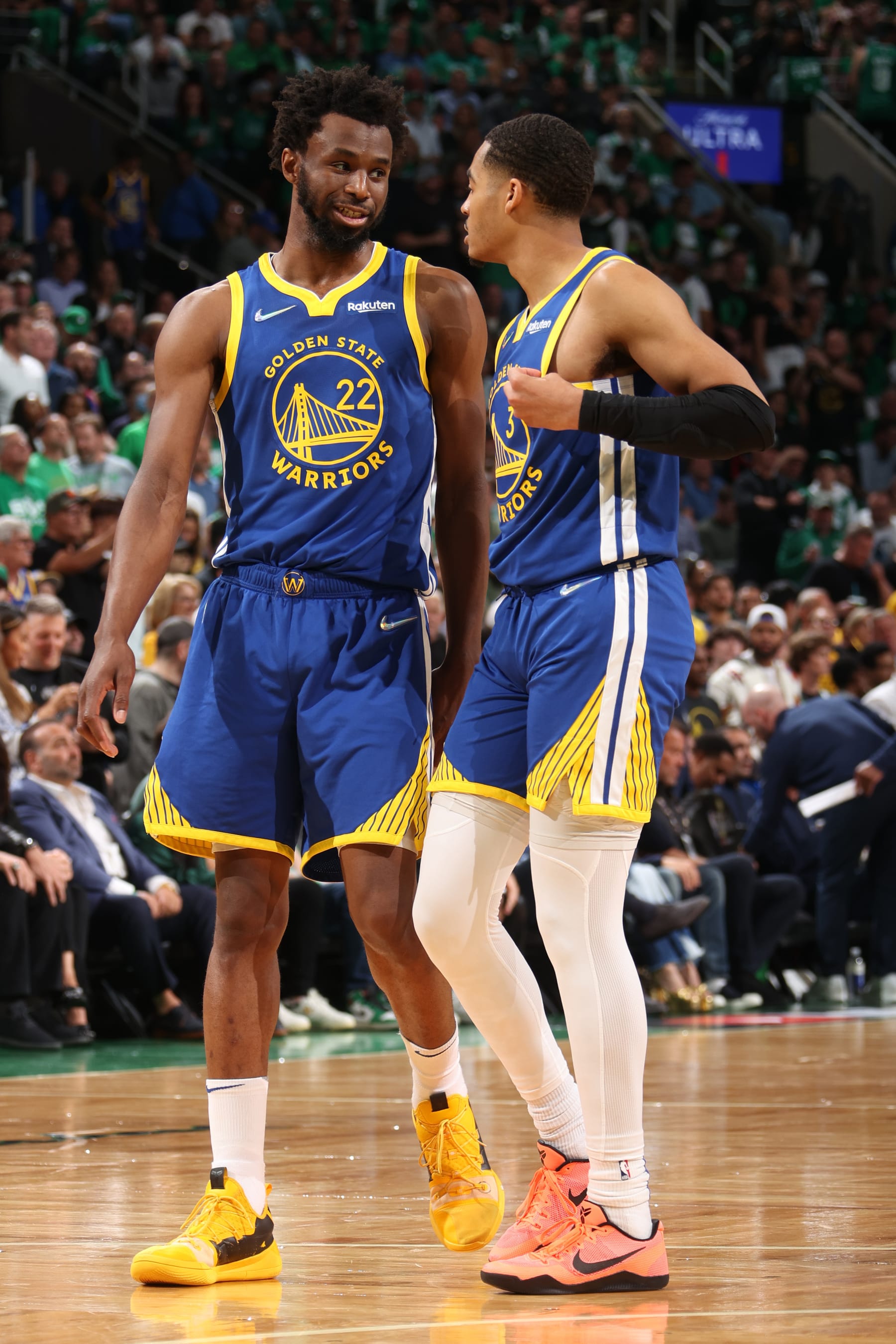 BOSTON, MA - JUNE 16: Andrew Wiggins #22 of the Golden State Warriors talks with Jordan Poole #3 of the Golden State Warriors during Game Six of the 2022 NBA Finals on June 16, 2022 at TD Garden in Boston, Massachusetts. NOTE TO USER: User expressly acknowledges and agrees that, by downloading and or using this photograph, user is consenting to the terms and conditions of Getty Images License Agreement. Mandatory Copyright Notice: Copyright 2022 NBAE (Photo by Nathaniel S. Butler/NBAE via Getty Images)