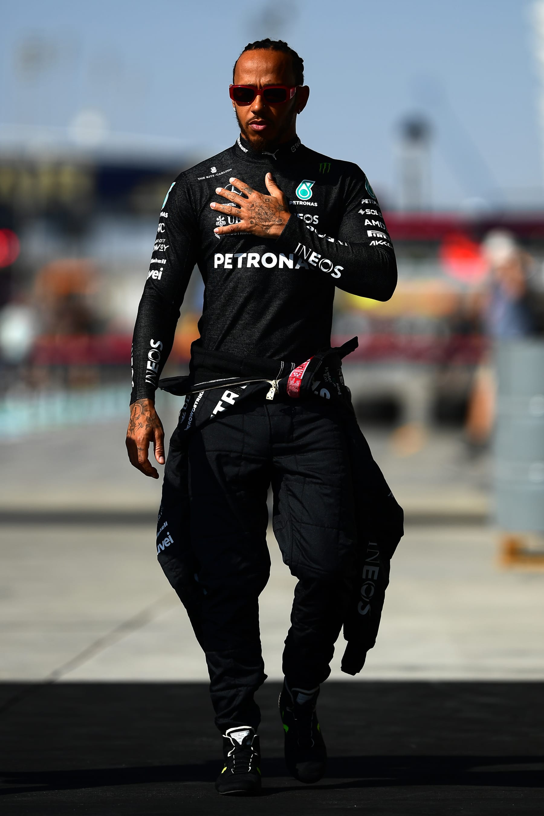 BAHRAIN, BAHRAIN - MARCH 02: Lewis Hamilton of Great Britain and Mercedes walks in the Paddock during previews ahead of the F1 Grand Prix of Bahrain at Bahrain International Circuit on March 02, 2023 in Bahrain, Bahrain. (Photo by Mario Renzi - Formula 1/Formula 1 via Getty Images)
