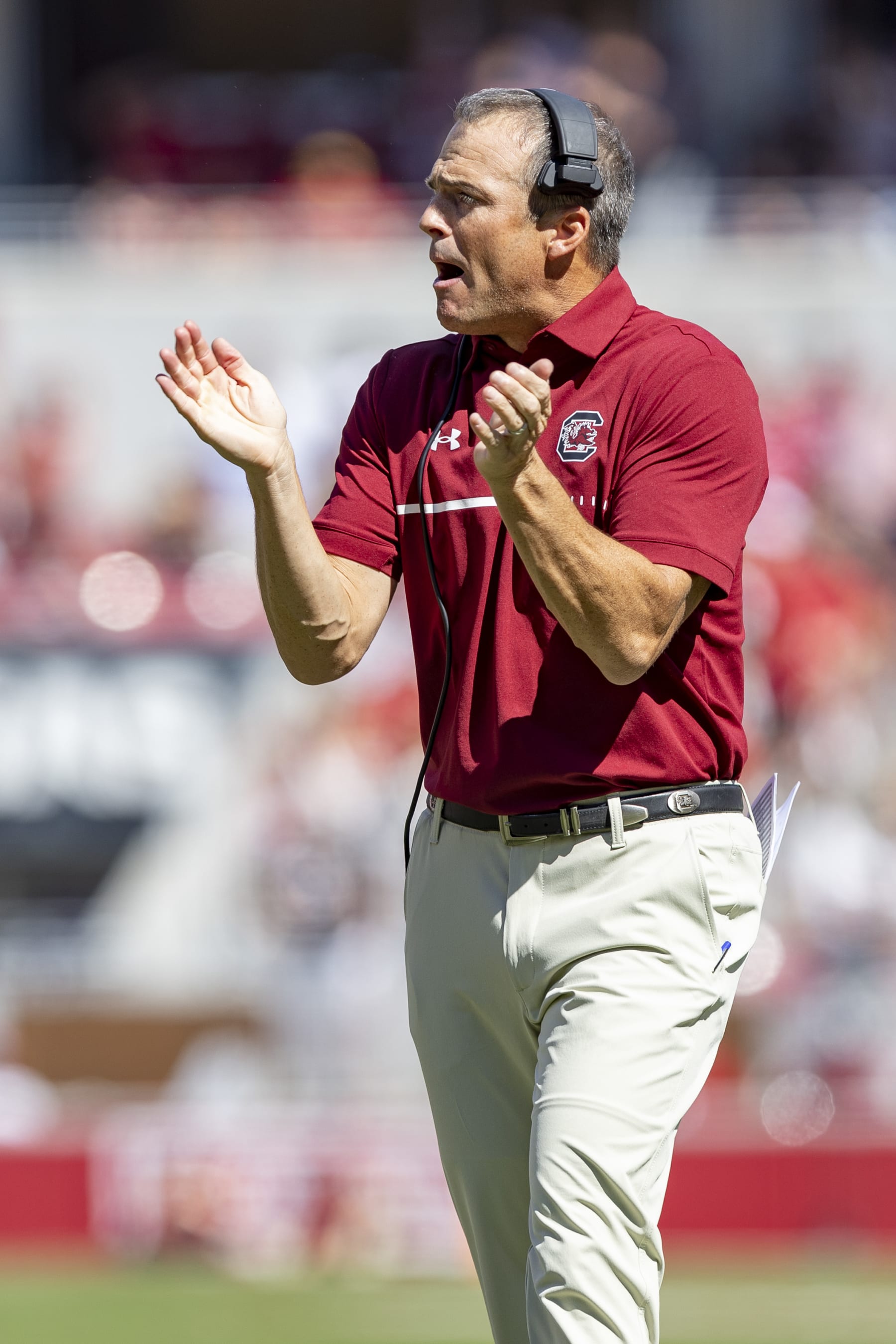 FAYETTEVILLE, ARKANSAS - SEPTEMBER 10: Head Coach Shane Beamer of the South Carolina Gamecocks on the field during a game against the Arkansas Razorbacks at Donald W. Reynolds Razorback Stadium on September 10, 2022 in Fayetteville, Arkansas. The Razorbacks defeated the Gamecocks 44-30.  (Photo by Wesley Hitt/Getty Images)