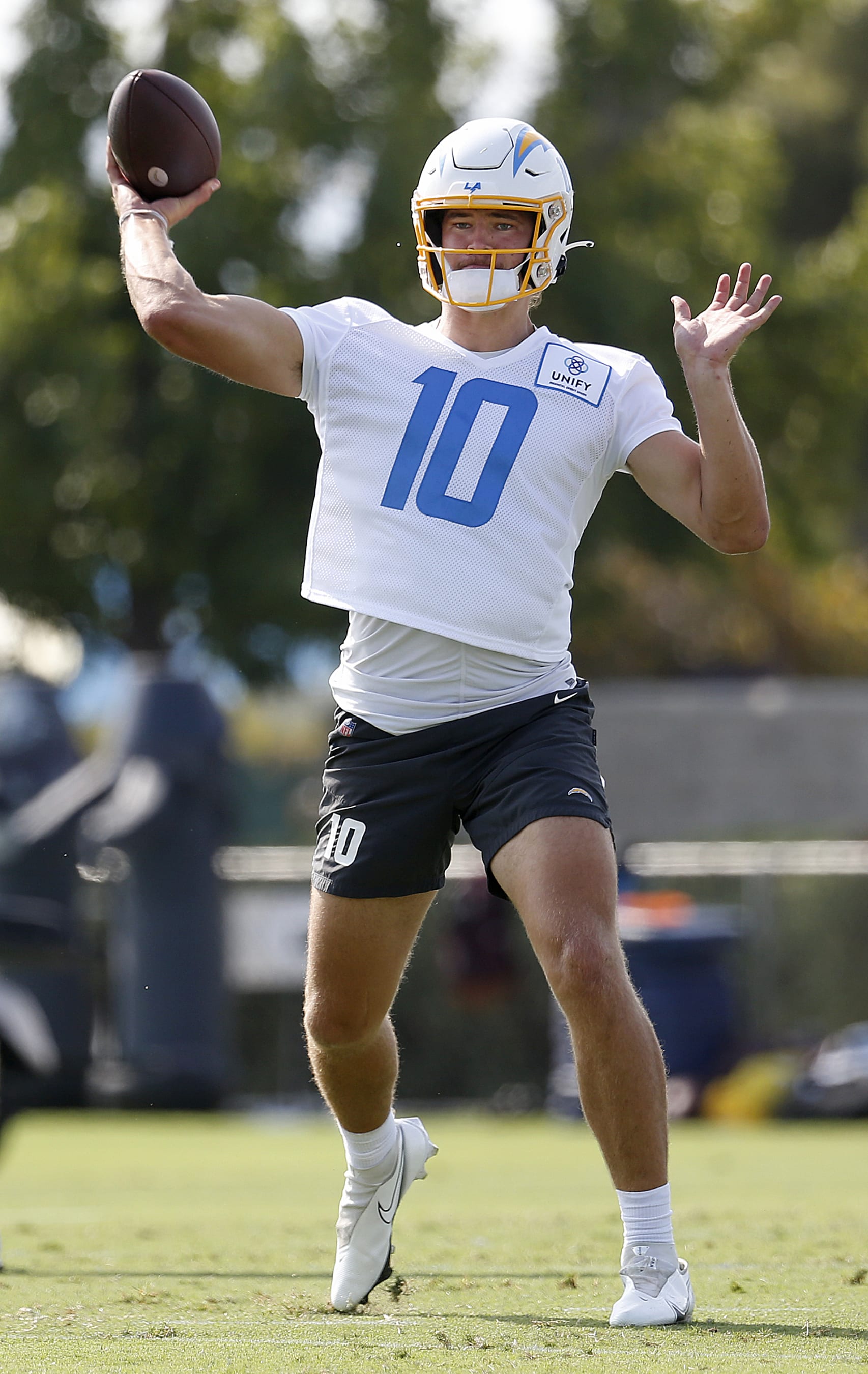 COSTA MESA, CA - JULY 28: Chargers quarterback Justin Herbert (10), center, at LA Chargers training camp at Jack R. Hammett Sports Complex on Thursday, July 28, 2022 in Costa Mesa, CA. (Gary Coronado / Los Angeles Times via Getty Images)