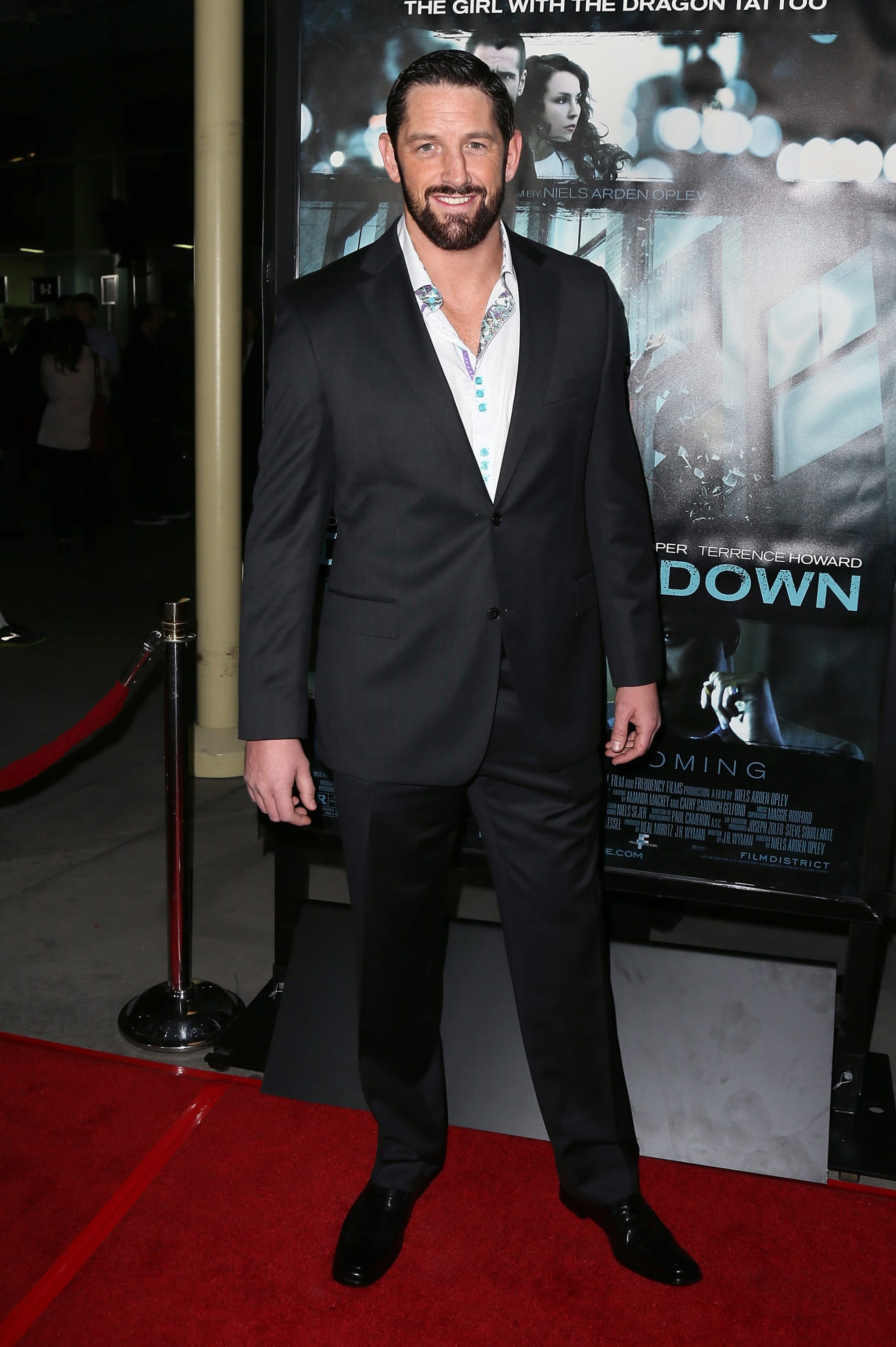 HOLLYWOOD, CA - FEBRUARY 26:  WWE Intercontinental Champion Wade Barrett attends the premiere of FilmDistrict's "Dead Man Down" at ArcLight Hollywood on February 26, 2013 in Hollywood, California.  (Photo by David Livingston/Getty Images)