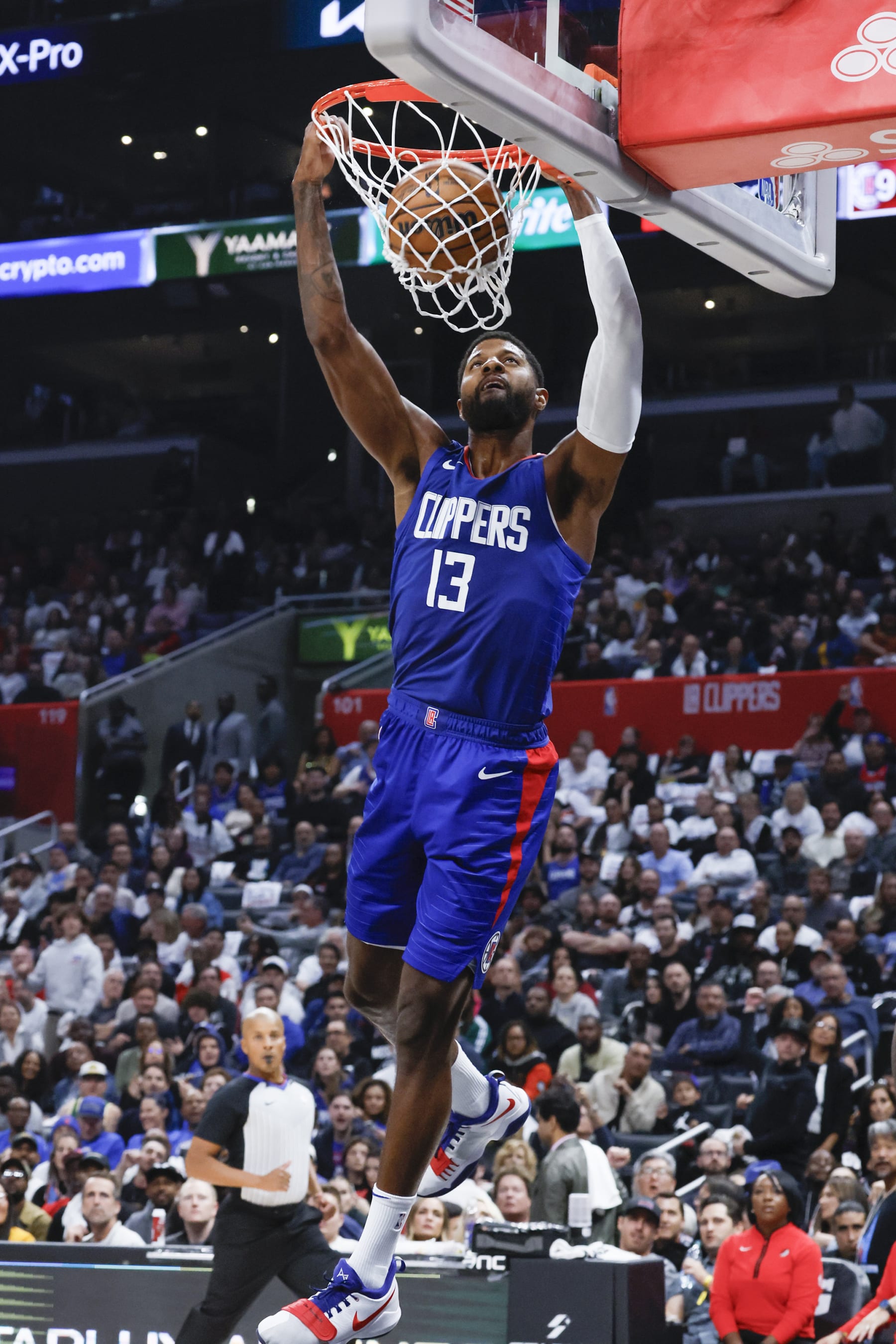 Los Angeles, CA, Wednesday, October 25, 2023 - LA Clippers forward Paul George (13) slams dunks the ball on a second half steal against the Portland Trail Blazers at Crypto.com Arena. (Robert Gauthier/Los Angeles Times via Getty Images)