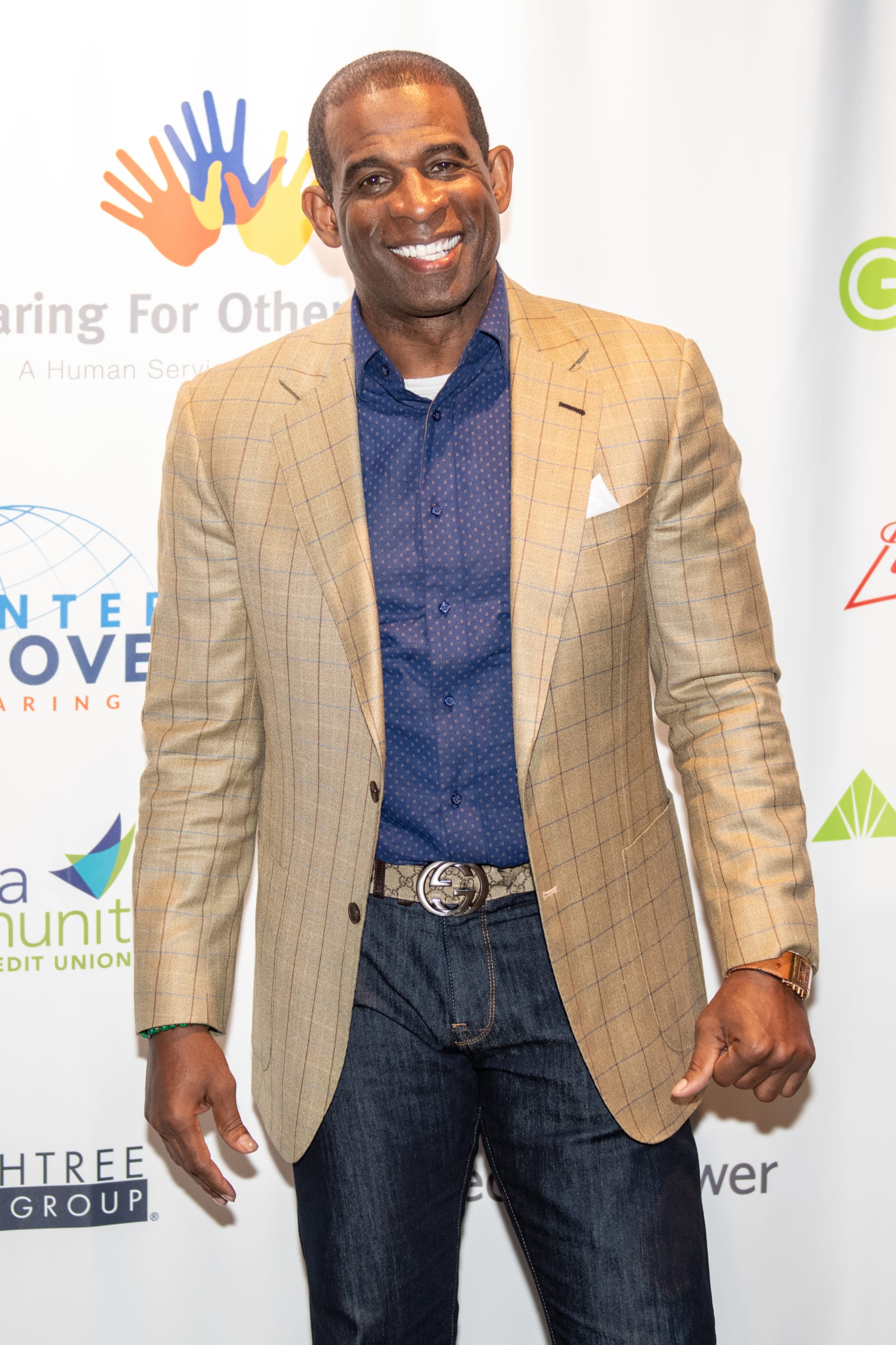 ATLANTA, GEORGIA - MARCH 04: Deion Sanders attends the 2022 International Poverty Forum at Porsche Cars North America on March 04, 2022 in Atlanta, Georgia. (Photo by Derek White/Getty Images)