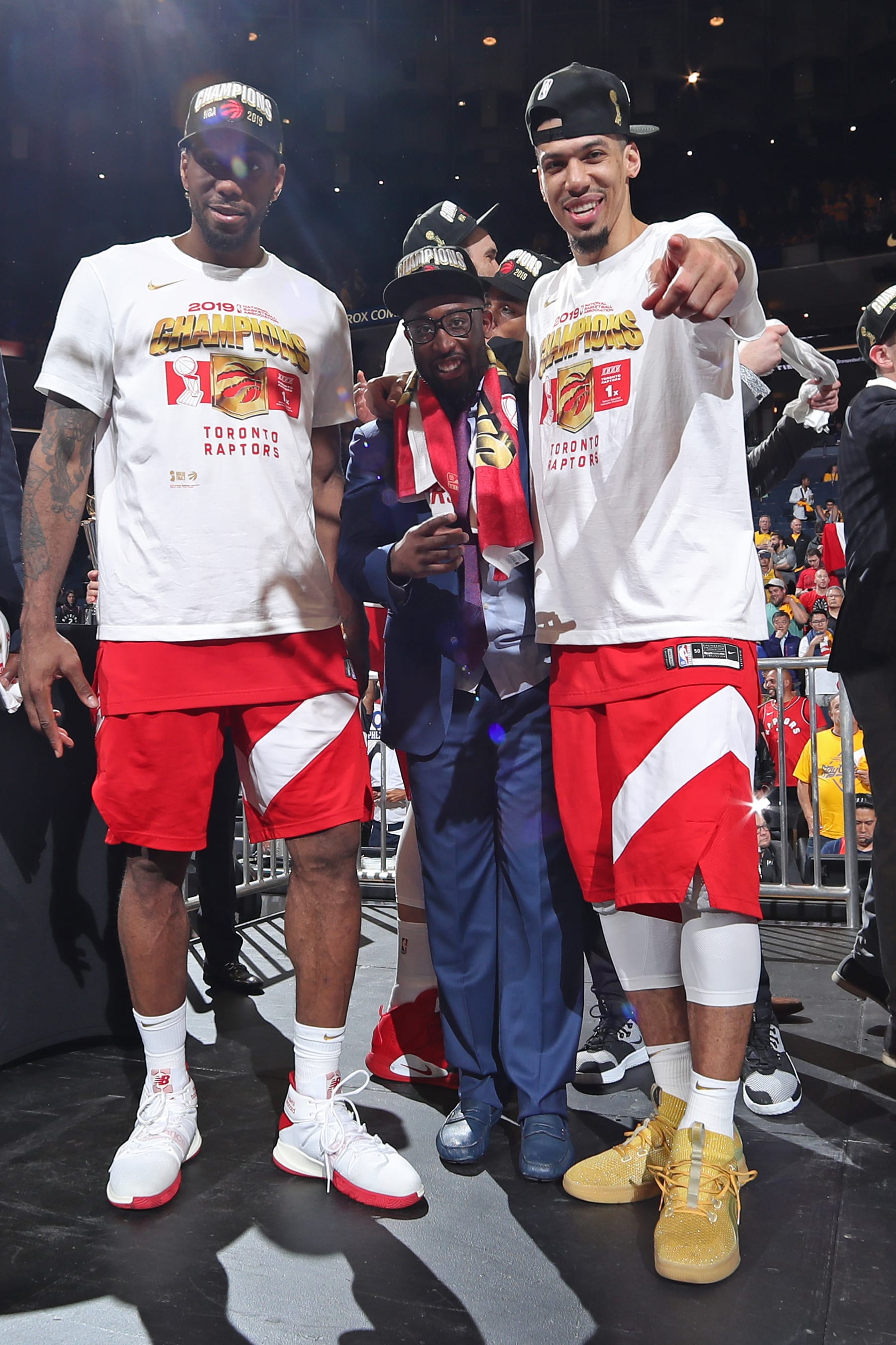OAKLAND, CA - JUNE 13: Kawhi Leonard #2 and Danny Green #14 of the Toronto Raptors react onstage after defeating the Golden State Warriors in Game Six of the 2019 NBA Finals on June 13, 2019 at ORACLE Arena in Oakland, California. NOTE TO USER: User expressly acknowledges and agrees that, by downloading and/or using this photograph, user is consenting to the terms and conditions of Getty Images License Agreement. Mandatory Copyright Notice: Copyright 2019 NBAE (Photo by Nathaniel S. Butler/NBAE via Getty Images)
