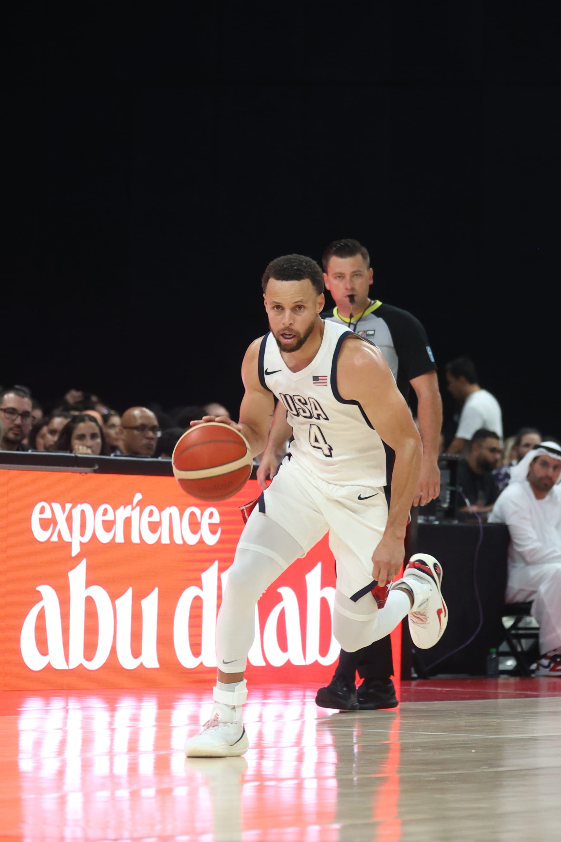 ABU DHABI, UAE - JULY 17: Stephen Curry #4 of Team USA dribbles the ball during the game against the Serbian Men's National Team during the 2024 USA Basketball Showcase on July 17, 2024 in Abu Dhabi, The United Arab Emirates at Etihad Arena. NOTE TO USER: User expressly acknowledges and agrees that, by downloading and/or using this Photograph, user is consenting to the terms and conditions of the Getty Images License Agreement. Mandatory Copyright Notice: Copyright 2024 NBAE (Photo by Nathaniel S. Butler/NBAE via Getty Images)