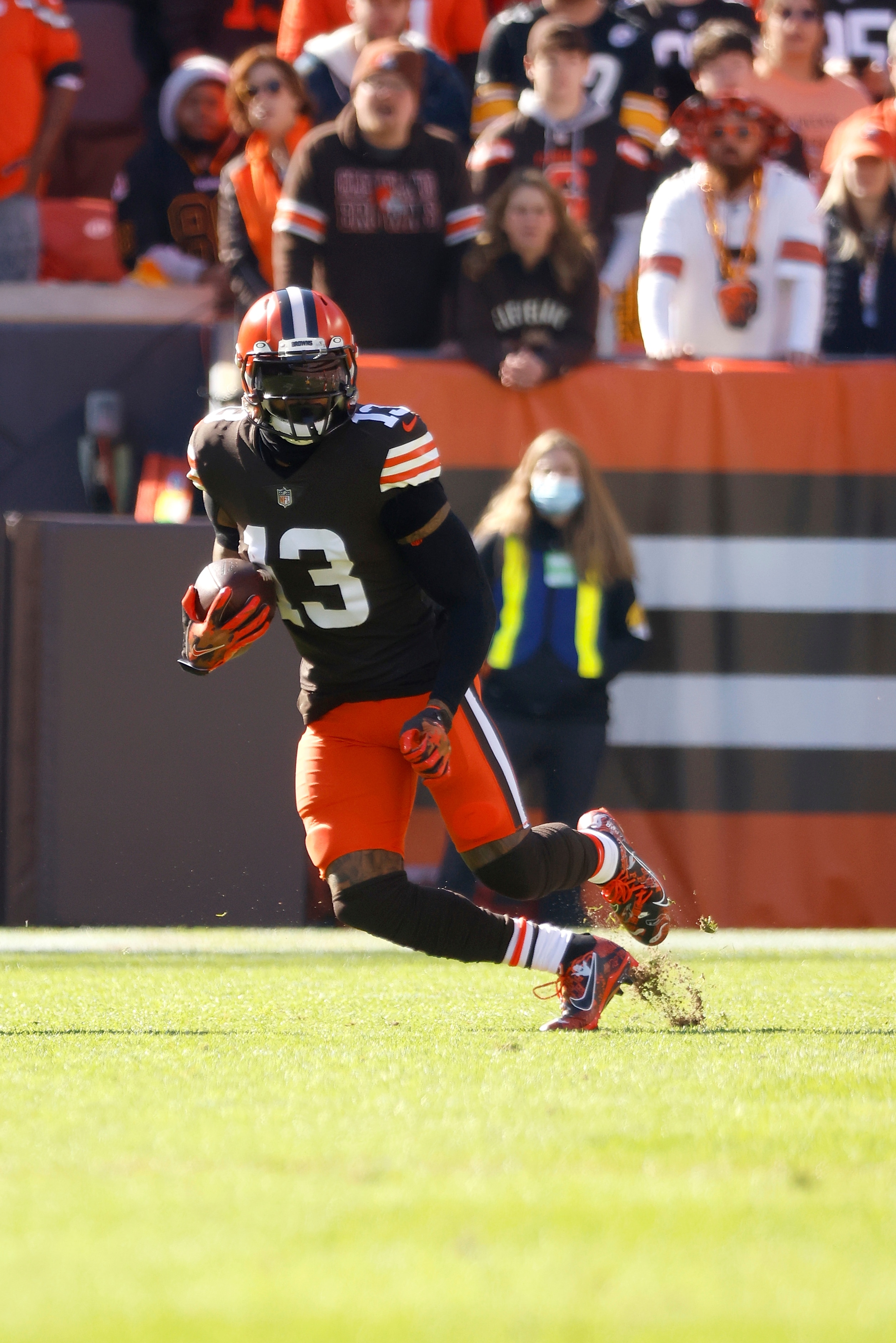 Cleveland Browns wide receiver Odell Beckham Jr. (13) runs with the ball during an NFL football game against the Pittsburgh Steelers, Sunday, Oct. 31, 2021, in Cleveland. (AP Photo/Kirk Irwin)