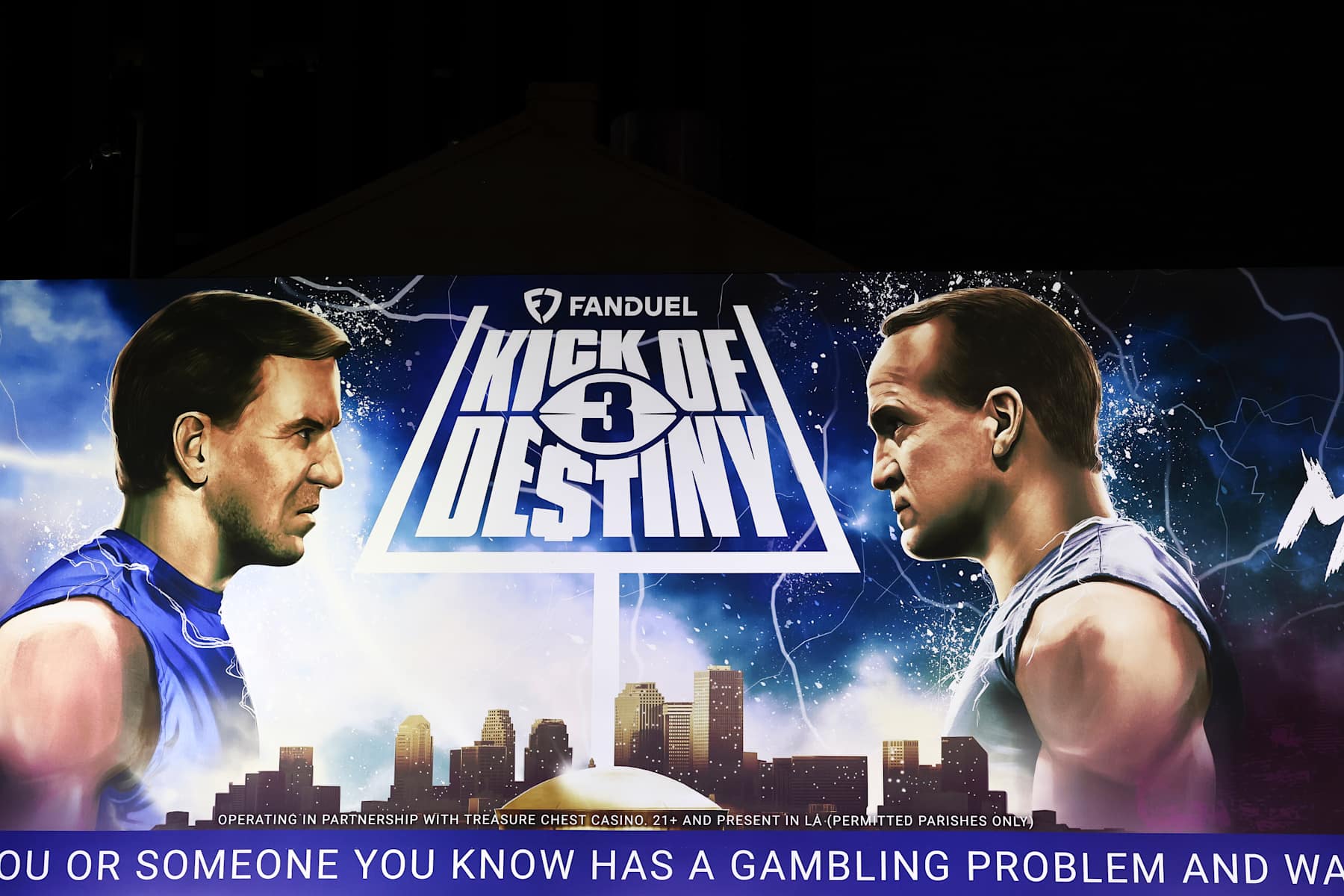 NEW ORLEANS, LOUISIANA - FEBRUARY 04: The FanDuel Kick of Destiny promotion with Eli and Peyton Manning on a billboard ahead of Super Bowl LIX between the Philadelphia Eagles and the Kansas City Chiefs on February 04, 2025 in New Orleans, Louisiana. (Photo by Aaron M. Sprecher/Getty Images)