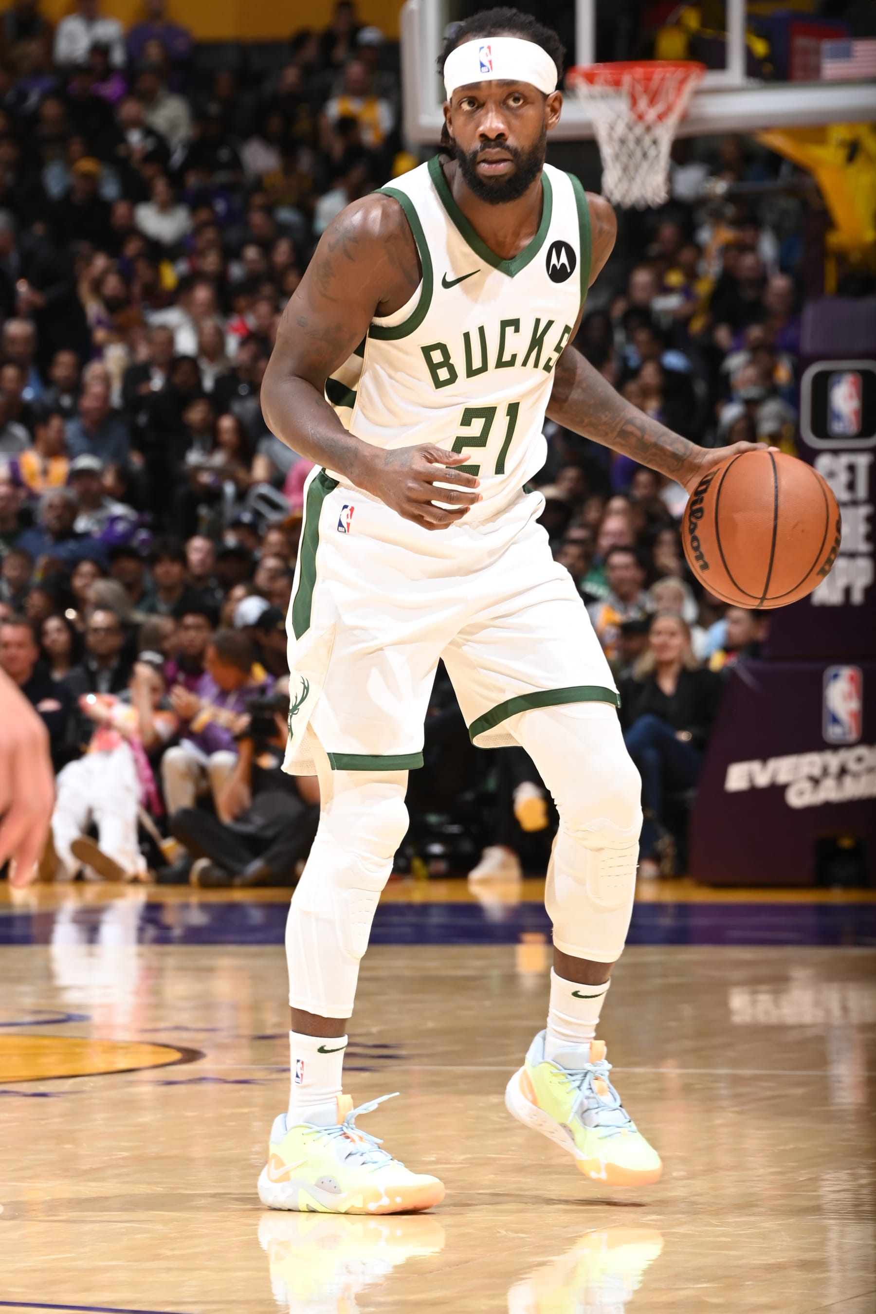 LOS ANGELES, CA - MARCH 8: Patrick Beverley #21 of the Milwaukee Bucks dribbles the ball during the game against the Los Angeles Lakers on March 8, 2024 at Crypto.Com Arena in Los Angeles, California. NOTE TO USER: User expressly acknowledges and agrees that, by downloading and/or using this Photograph, user is consenting to the terms and conditions of the Getty Images License Agreement. Mandatory Copyright Notice: Copyright 2024 NBAE (Photo by Andrew D. Bernstein/NBAE via Getty Images)