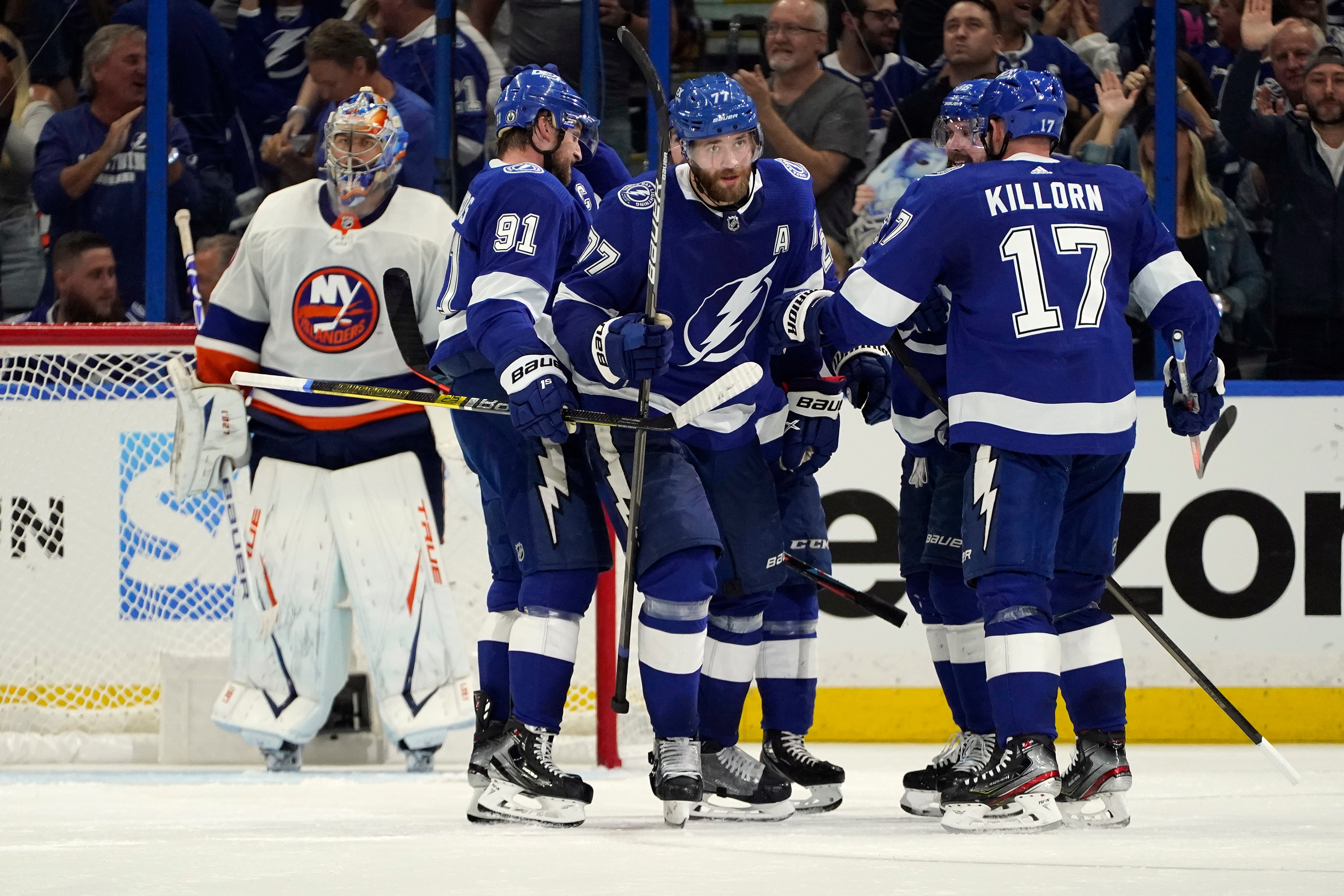 Tampa Bay Lightning defenseman Victor Hedman (77) celebrates his goal against the New York Islanders with left wing Alex Killorn (17) and center Steven Stamkos (91) during the third period in Game 2 of an NHL hockey Stanley Cup semifinal playoff series Tuesday, June 15, 2021, in Tampa, Fla. (AP Photo/Chris O'Meara)
