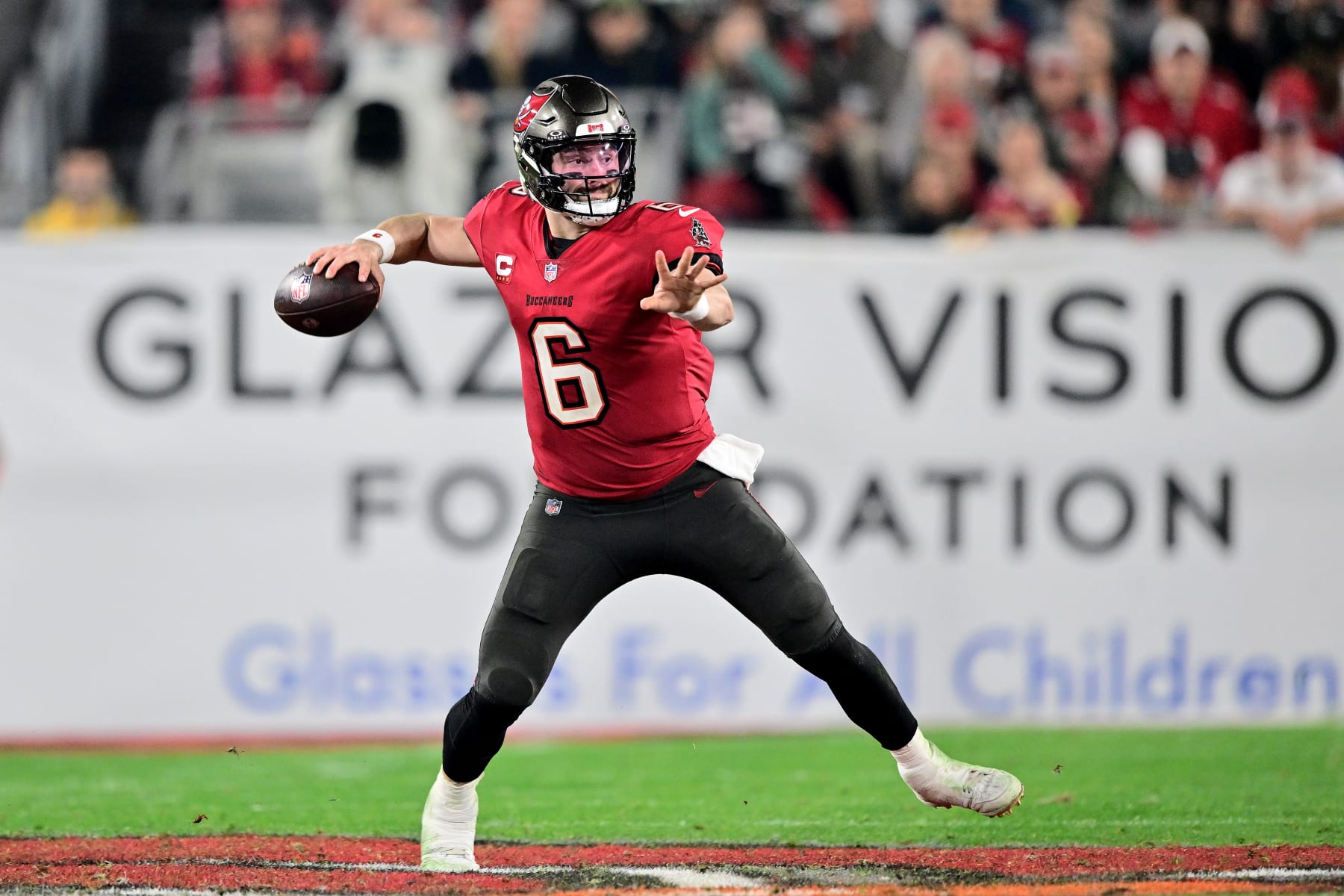 TAMPA, FLORIDA - JANUARY 15: Baker Mayfield #6 of the Tampa Bay Buccaneers throws a pass against the Philadelphia Eagles in the NFC Wild Card Playoffs at Raymond James Stadium on January 15, 2024 in Tampa, Florida. (Photo by Julio Aguilar/Getty Images)