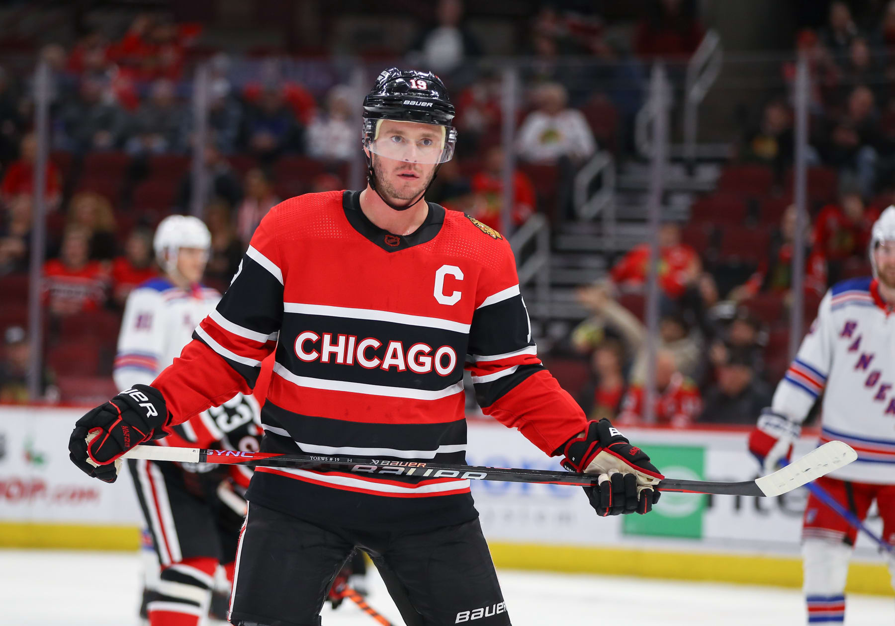 CHICAGO, IL - DECEMBER 18: Chicago Blackhawks Center Jonathan Toews (19) looks on during a game between the New York Rangers and the Chicago Blackhawks on December 18, 2022 at the United Center in Chicago, IL. (Photo by Melissa Tamez/Icon Sportswire via Getty Images)