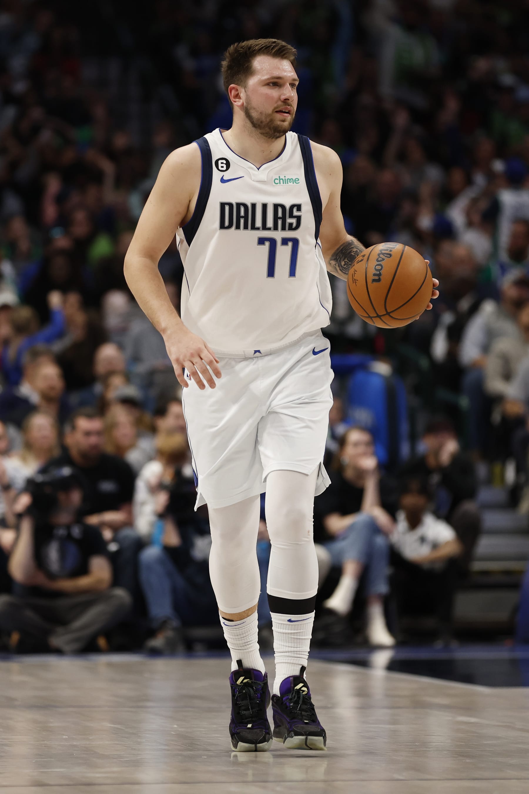 DALLAS, TEXAS - APRIL 07: Luka Doncic #77 of the Dallas Mavericks dribbles up court in the game against the Chicago Bulls at American Airlines Center on April 07, 2023 in Dallas, Texas. NOTE TO USER: User expressly acknowledges and agrees that, by downloading and or using this photograph, User is consenting to the terms and conditions of the Getty Images License Agreement. (Photo by Tim Heitman/Getty Images)