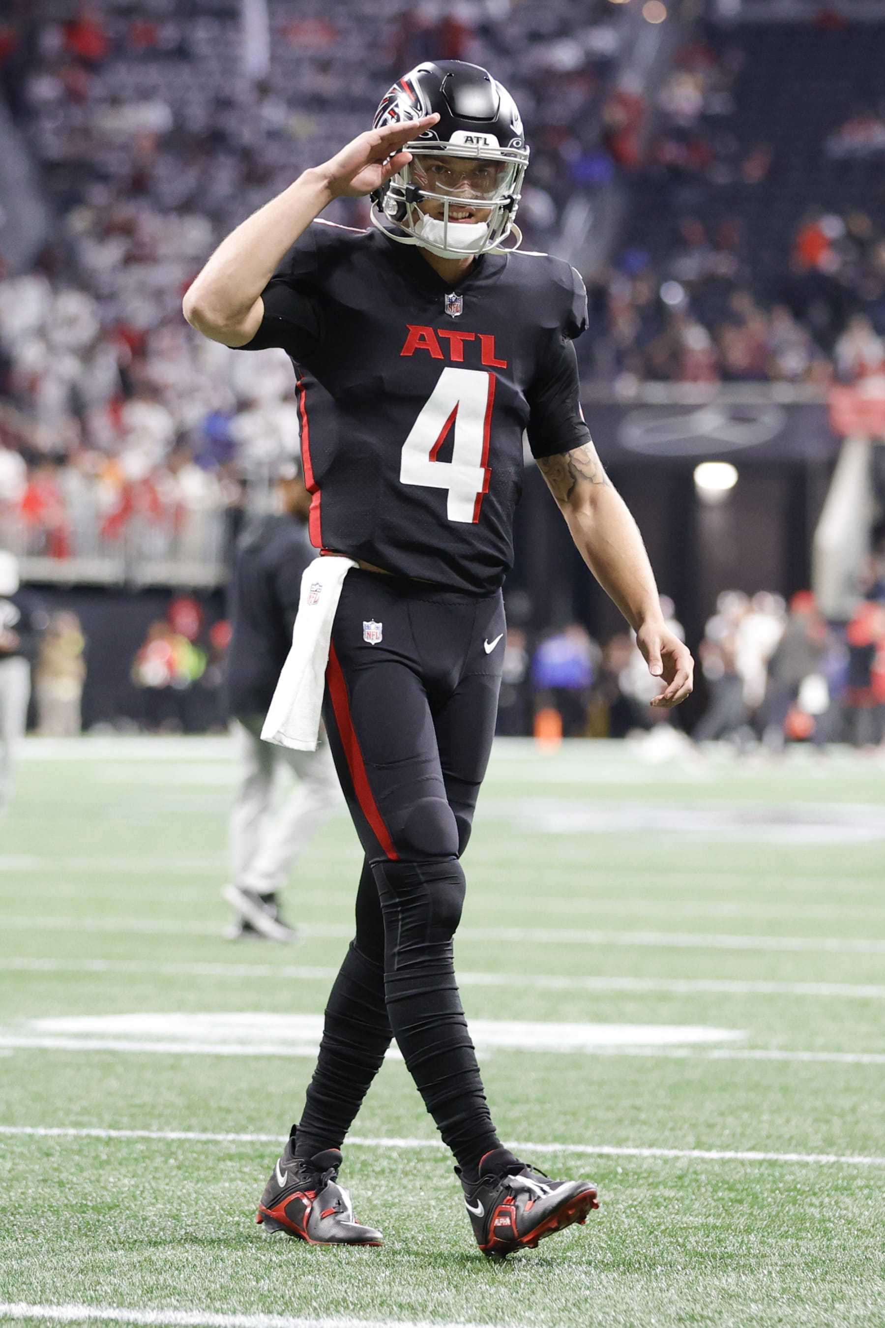 ATLANTA, GEORGIA - JANUARY 08: Desmond Ridder #4 of the Atlanta Falcons reacts prior to the game against the Tampa Bay Buccaneers at Mercedes-Benz Stadium on January 08, 2023 in Atlanta, Georgia. (Photo by Alex Slitz/Getty Images)