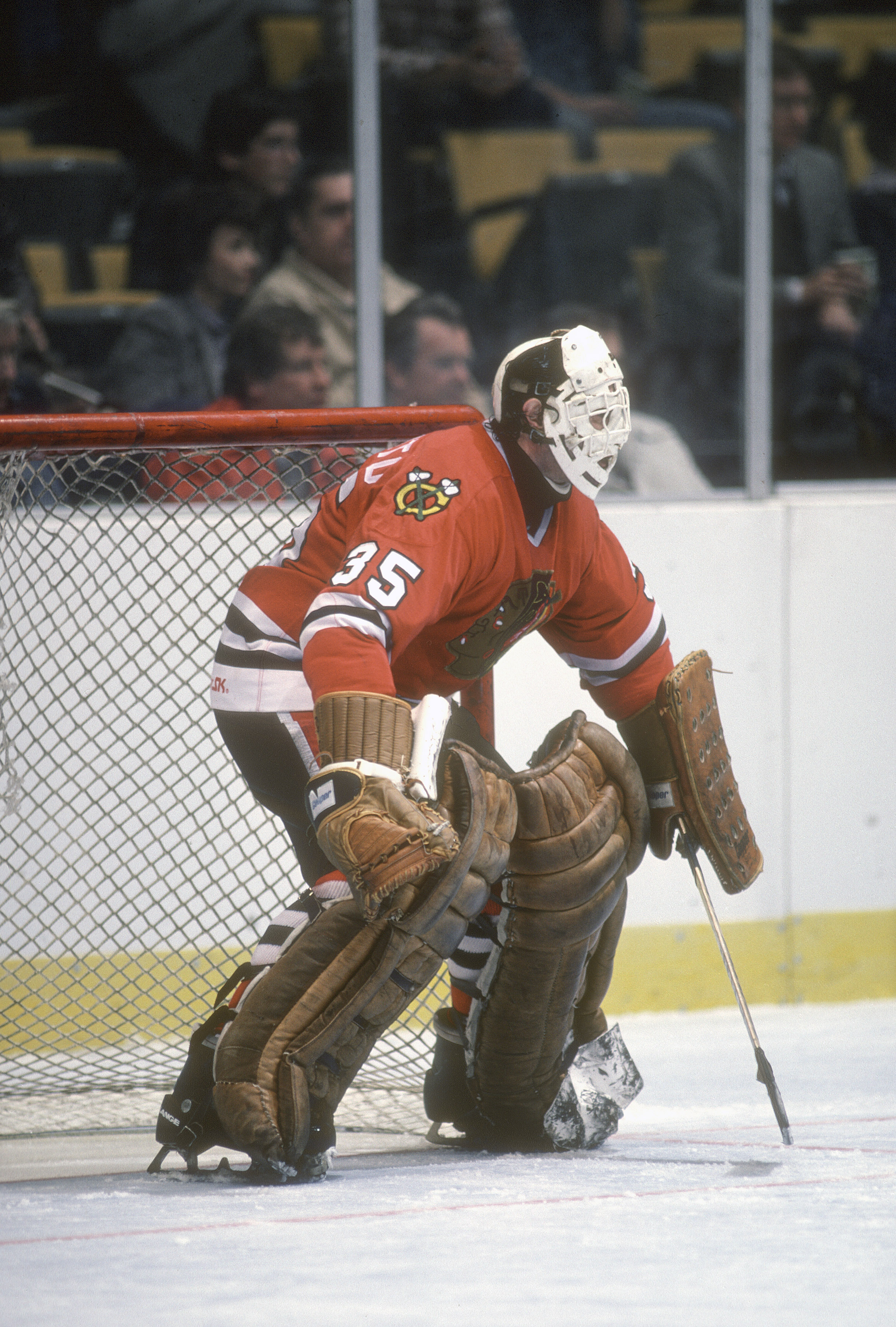NEW YORK - CIRCA 1982:  Tony Esposito #35 of the Chicago Blackhawks defends his goal against the New York Rangers during an NHL Hockey game circa 1982 at Madison Square Garden in the Manhattan borough of New York City. Esposito's playing career went from 1967-84. (Photo by Focus on Sport/Getty Images)